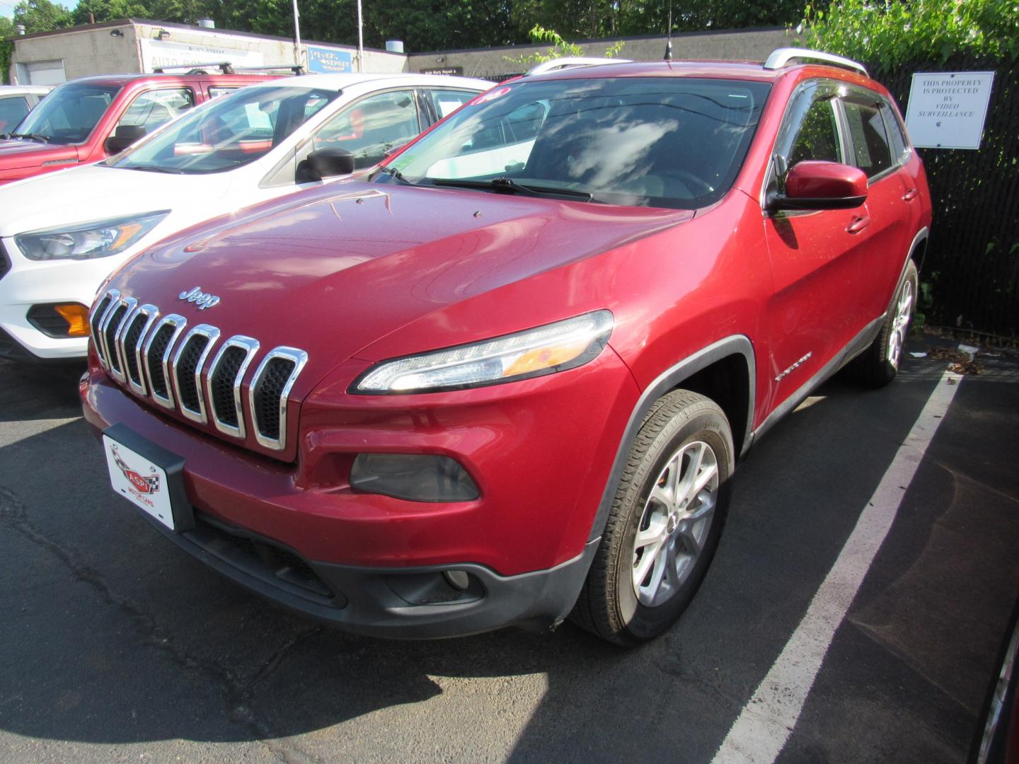 2016 red /Gray Jeep Cherokee Latitude 4WD (1C4PJMCB2GW) with an 2.4L L4 DOHC 16V engine, 9A transmission, located at 215 Milton St, Dedham, MA, 02026, (781) 329-5144, 42.241905, -71.157295 - This nice little SUV has low mileage. Runs great. All ASPI Motor Cars vehicles are fully servi9ce before they are delivered. Comes with a 3/3 warranty included in the price. Call for details. - Photo#2