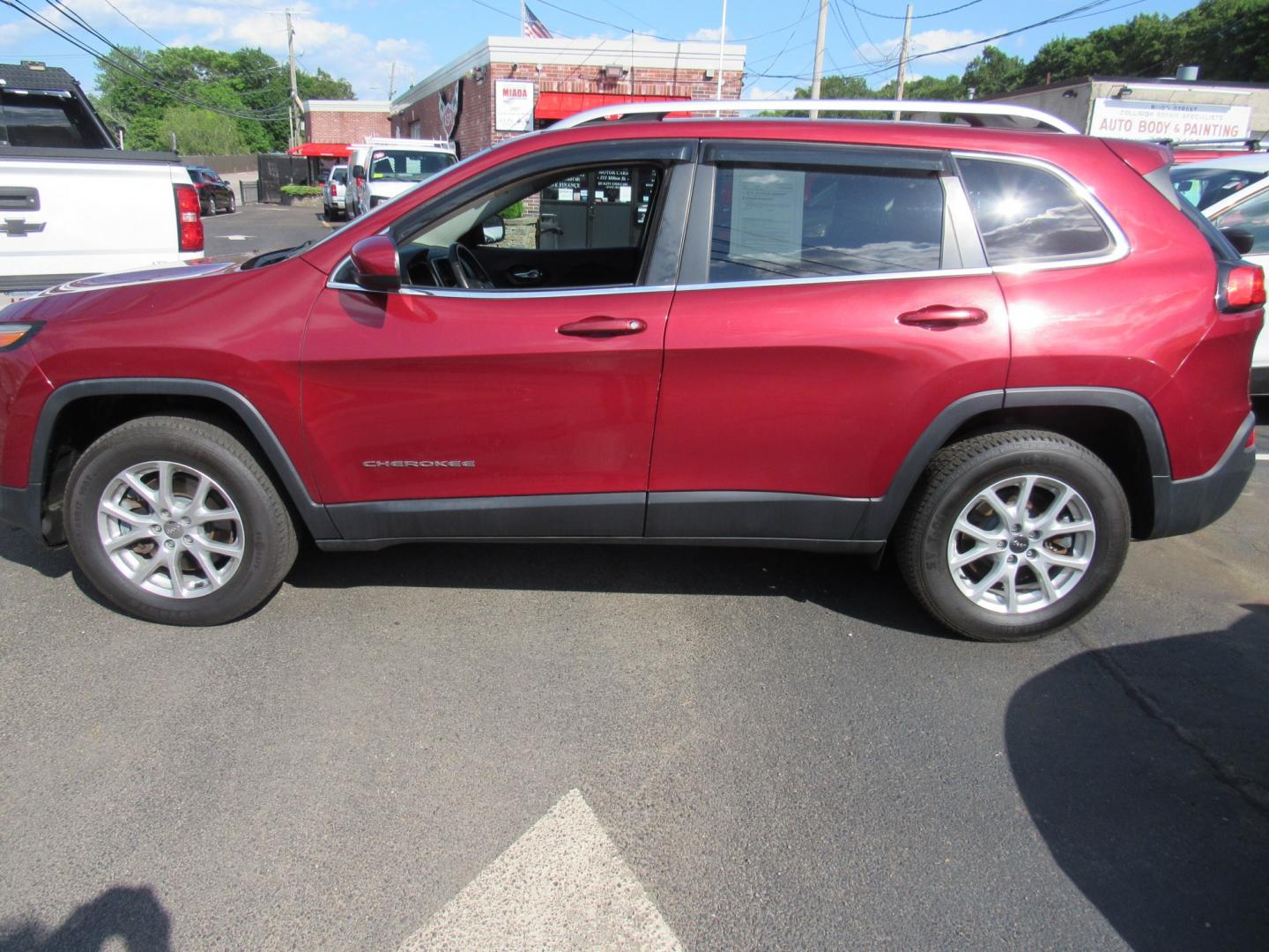 2016 red /Gray Jeep Cherokee Latitude 4WD (1C4PJMCB2GW) with an 2.4L L4 DOHC 16V engine, 9A transmission, located at 215 Milton St, Dedham, MA, 02026, (781) 329-5144, 42.241905, -71.157295 - This nice little SUV has low mileage. Runs great. All ASPI Motor Cars vehicles are fully servi9ce before they are delivered. Comes with a 3/3 warranty included in the price. Call for details. - Photo#3
