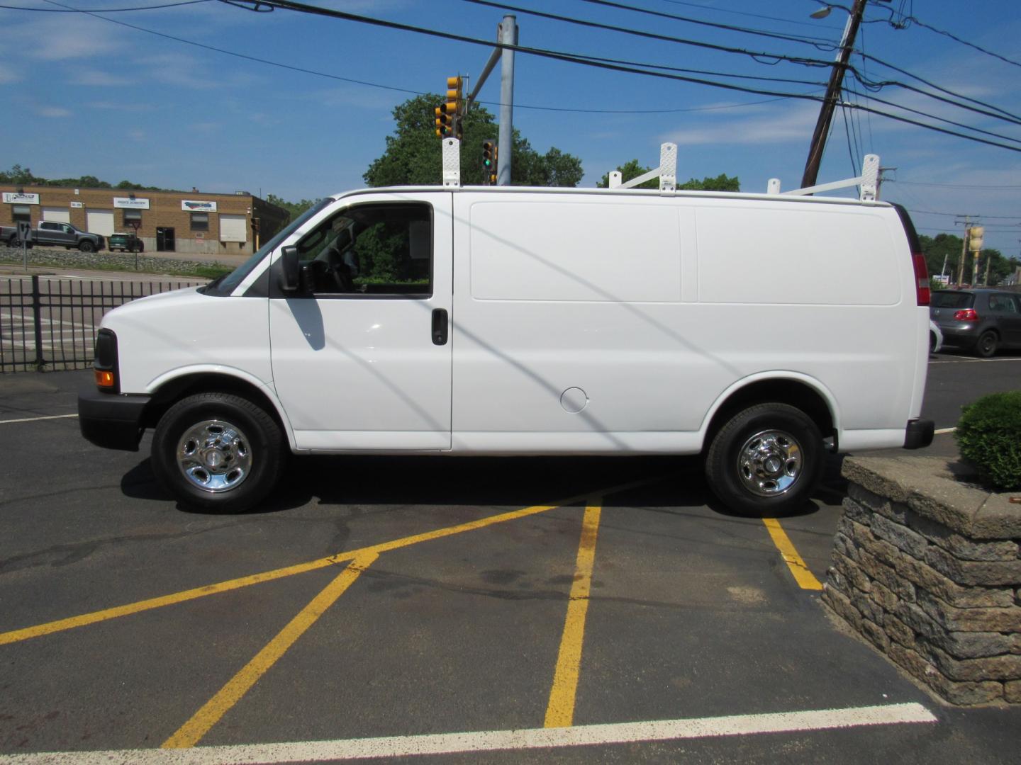 2016 White /Gray Chevrolet Express 2500 Cargo (1GCWGAFF8G1) with an 4.8L V8 FFV engine, 6A transmission, located at 215 Milton St, Dedham, MA, 02026, (781) 329-5144, 42.241905, -71.157295 - Where is the next one with 22 K miles on it. Great opportunity to save big on this nice work van. Racks and bins as well as ladder racks already installed. Fully serviced and ready to go. This was a local facility maintenance van that never left the campus except for service. Check it out today! - Photo#3