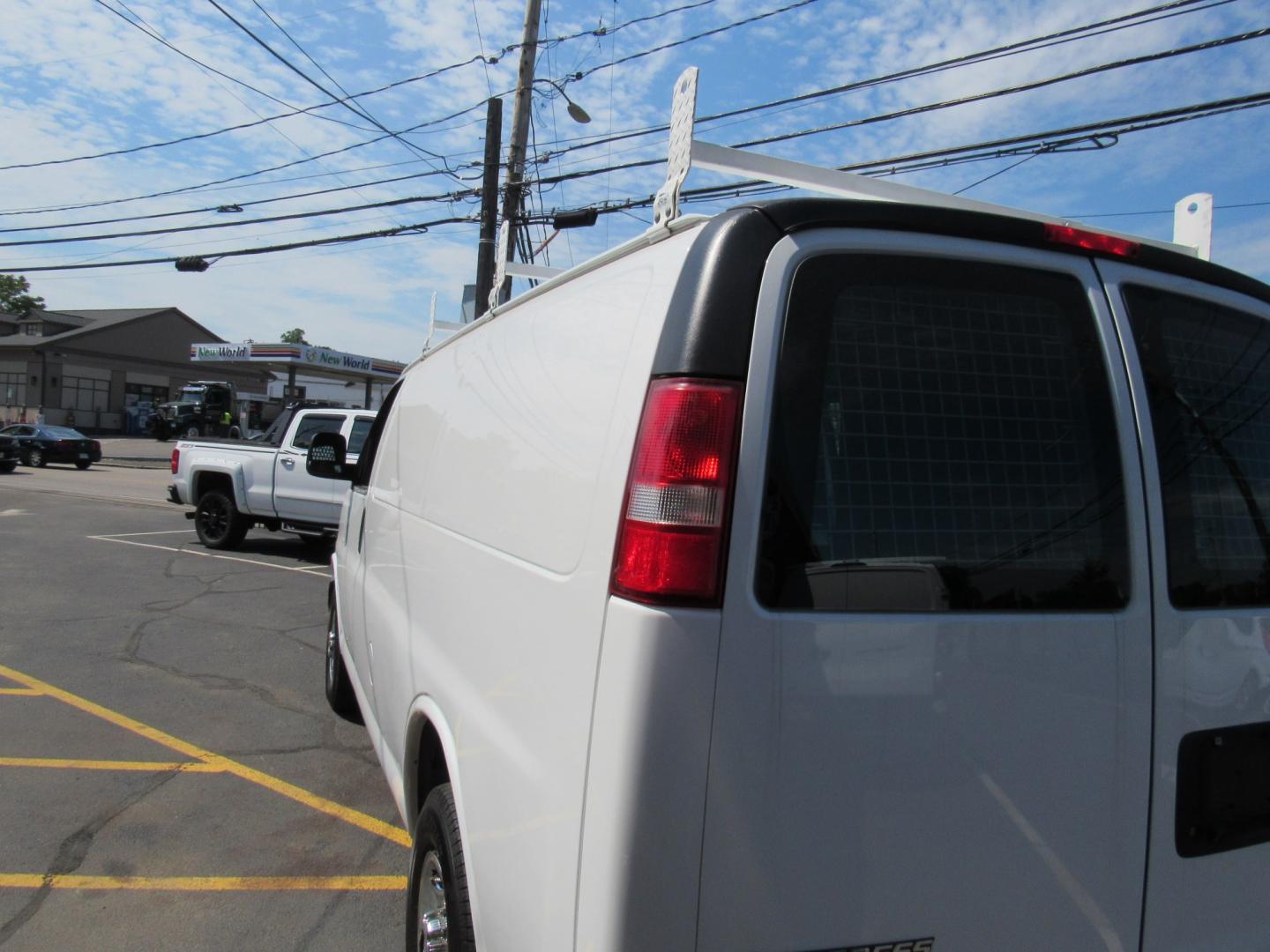 2016 White /Gray Chevrolet Express 2500 Cargo (1GCWGAFF8G1) with an 4.8L V8 FFV engine, 6A transmission, located at 215 Milton St, Dedham, MA, 02026, (781) 329-5144, 42.241905, -71.157295 - Where is the next one with 22 K miles on it. Great opportunity to save big on this nice work van. Racks and bins as well as ladder racks already installed. Fully serviced and ready to go. This was a local facility maintenance van that never left the campus except for service. Check it out today! - Photo#4