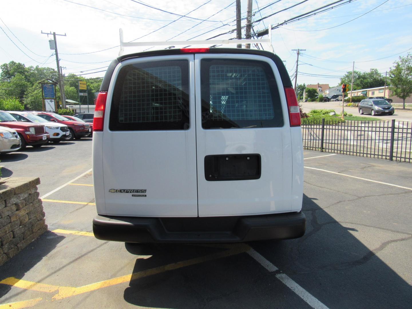 2016 White /Gray Chevrolet Express 2500 Cargo (1GCWGAFF8G1) with an 4.8L V8 FFV engine, 6A transmission, located at 215 Milton St, Dedham, MA, 02026, (781) 329-5144, 42.241905, -71.157295 - Where is the next one with 22 K miles on it. Great opportunity to save big on this nice work van. Racks and bins as well as ladder racks already installed. Fully serviced and ready to go. This was a local facility maintenance van that never left the campus except for service. Check it out today! - Photo#5