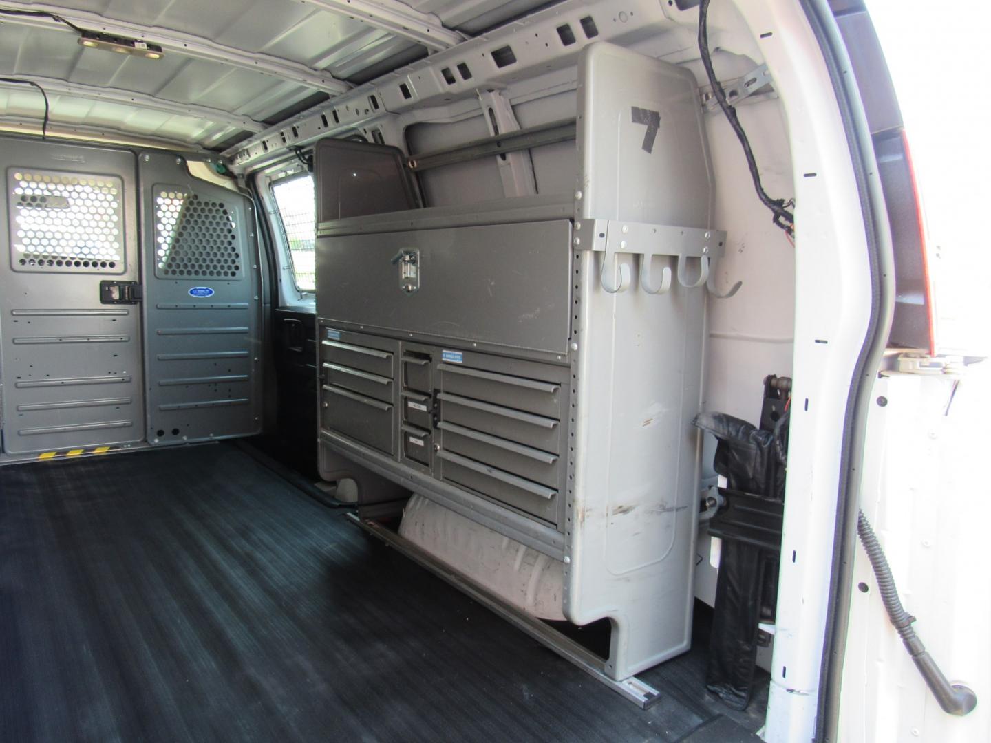 2016 White /Gray Chevrolet Express 2500 Cargo (1GCWGAFF8G1) with an 4.8L V8 FFV engine, 6A transmission, located at 215 Milton St, Dedham, MA, 02026, (781) 329-5144, 42.241905, -71.157295 - Where is the next one with 22 K miles on it. Great opportunity to save big on this nice work van. Racks and bins as well as ladder racks already installed. Fully serviced and ready to go. This was a local facility maintenance van that never left the campus except for service. Check it out today! - Photo#13