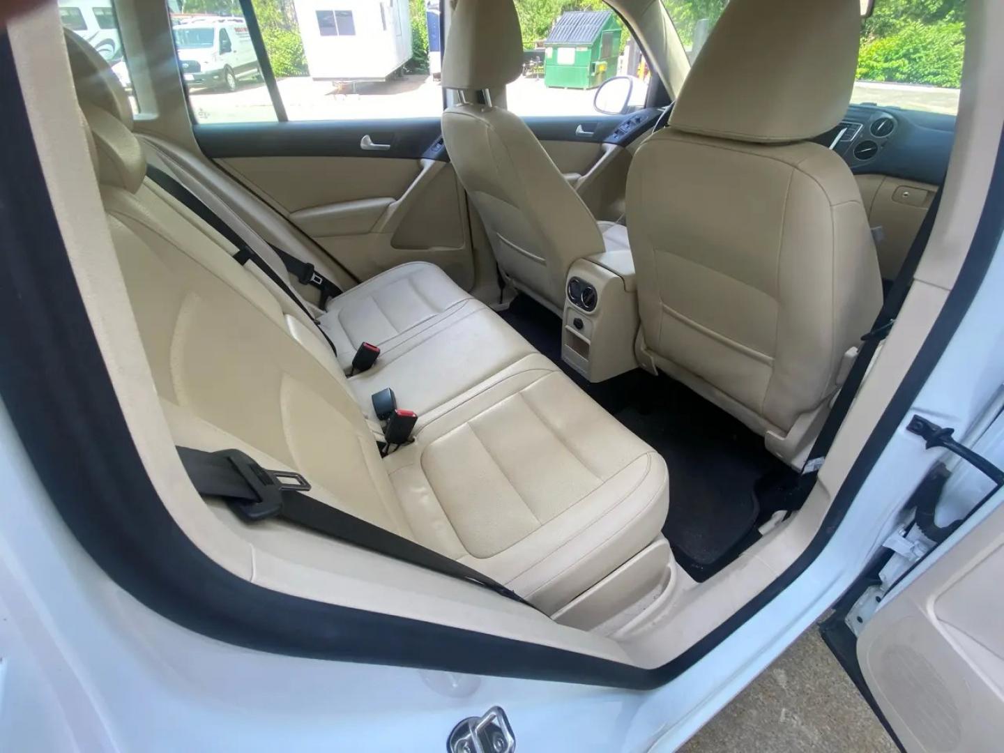 2016 White /Tan Volkswagen Tiguan SE 4Motion (WVGBV7AX5GW) with an 2.0L L4 DOHC 16V TURBO engine, 6A transmission, located at 215 Milton St, Dedham, MA, 02026, (781) 329-5144, 42.241905, -71.157295 - Hop into this sporty 2016 Volkswagen Tiguan and get ready for an adventure! With sleek white exterior and stylish alloy wheels, this car is sure to turn heads as you cruise down the road. You can rest easy knowing that safety is a top priority with features like ABS brakes, traction control, and mul- Photo#16