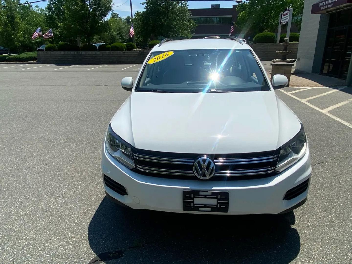 2016 White /Tan Volkswagen Tiguan SE 4Motion (WVGBV7AX5GW) with an 2.0L L4 DOHC 16V TURBO engine, 6A transmission, located at 215 Milton St, Dedham, MA, 02026, (781) 329-5144, 42.241905, -71.157295 - Hop into this sporty 2016 Volkswagen Tiguan and get ready for an adventure! With sleek white exterior and stylish alloy wheels, this car is sure to turn heads as you cruise down the road. You can rest easy knowing that safety is a top priority with features like ABS brakes, traction control, and mul- Photo#6