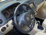 2016 White /Tan Volkswagen Tiguan SE 4Motion (WVGBV7AX5GW) with an 2.0L L4 DOHC 16V TURBO engine, 6A transmission, located at 215 Milton St, Dedham, MA, 02026, (781) 329-5144, 42.241905, -71.157295 - Hop into this sporty 2016 Volkswagen Tiguan and get ready for an adventure! With sleek white exterior and stylish alloy wheels, this car is sure to turn heads as you cruise down the road. You can rest easy knowing that safety is a top priority with features like ABS brakes, traction control, and mul- Photo#8