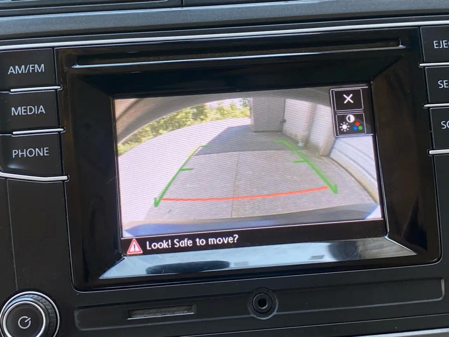 2016 White /Tan Volkswagen Tiguan SE 4Motion (WVGBV7AX5GW) with an 2.0L L4 DOHC 16V TURBO engine, 6A transmission, located at 215 Milton St, Dedham, MA, 02026, (781) 329-5144, 42.241905, -71.157295 - Hop into this sporty 2016 Volkswagen Tiguan and get ready for an adventure! With sleek white exterior and stylish alloy wheels, this car is sure to turn heads as you cruise down the road. You can rest easy knowing that safety is a top priority with features like ABS brakes, traction control, and mul- Photo#15