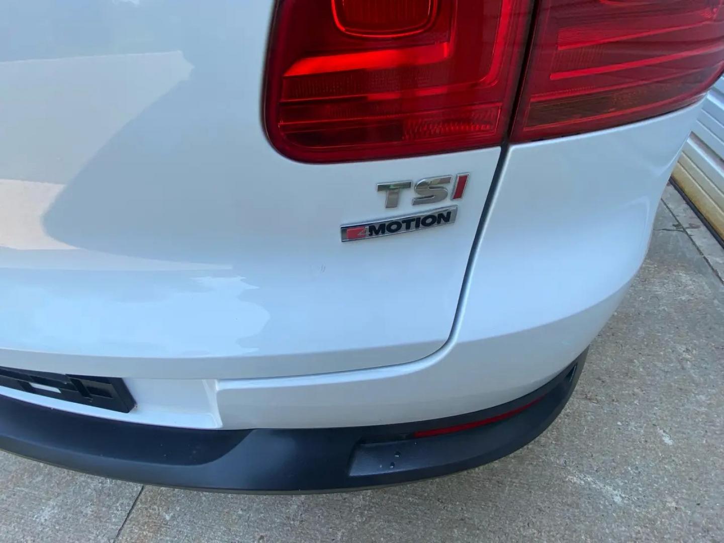 2016 White /Tan Volkswagen Tiguan SE 4Motion (WVGBV7AX5GW) with an 2.0L L4 DOHC 16V TURBO engine, 6A transmission, located at 215 Milton St, Dedham, MA, 02026, (781) 329-5144, 42.241905, -71.157295 - Hop into this sporty 2016 Volkswagen Tiguan and get ready for an adventure! With sleek white exterior and stylish alloy wheels, this car is sure to turn heads as you cruise down the road. You can rest easy knowing that safety is a top priority with features like ABS brakes, traction control, and mul- Photo#24