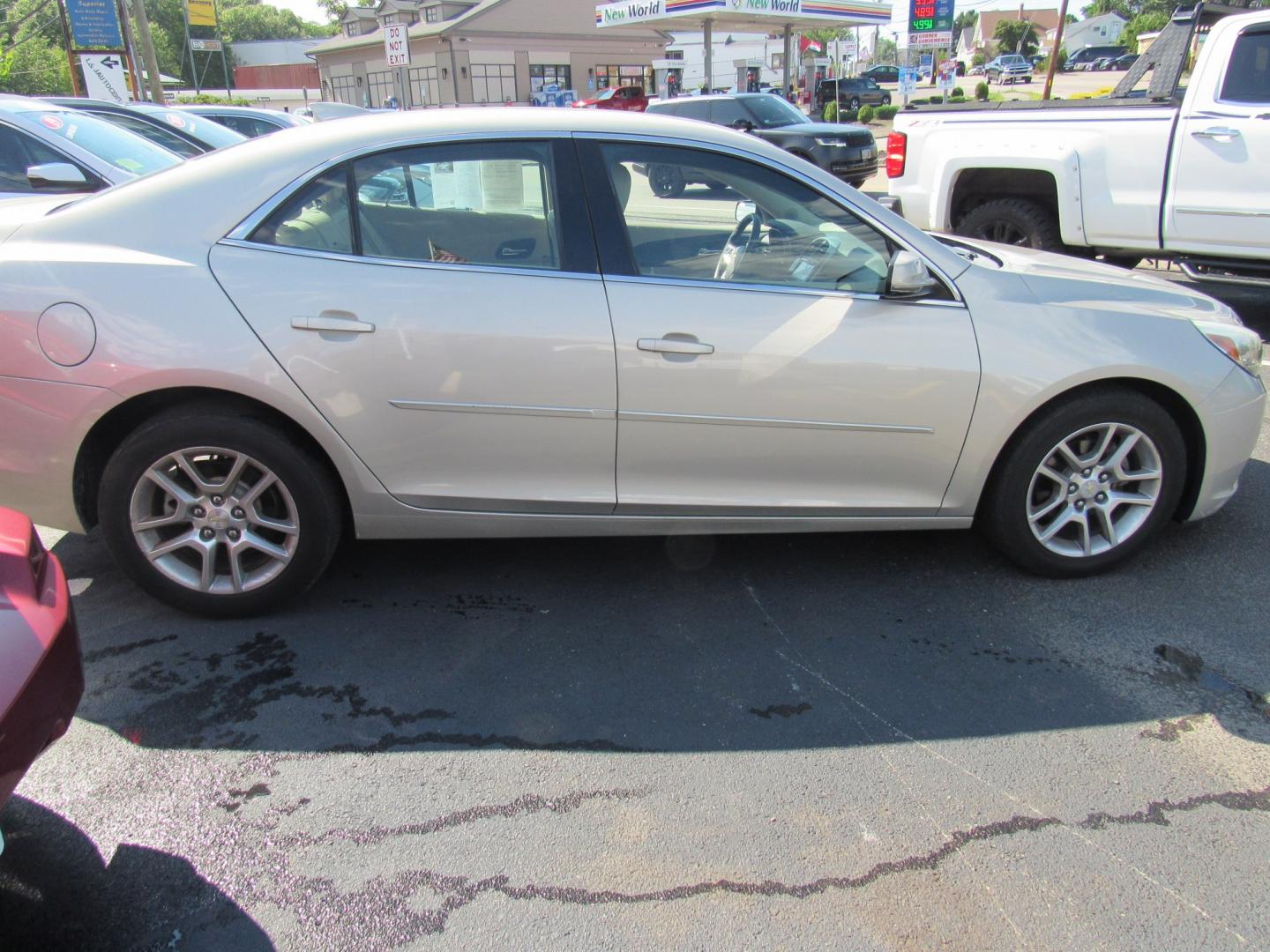 2015 Tan /Tan Chevrolet Malibu 1LT (1G11C5SL7FF) with an 2.5L L4 DOHC 16V engine, 6A transmission, located at 215 Milton St, Dedham, MA, 02026, (781) 329-5144, 42.241905, -71.157295 - Get ready to cruise in style in this sleek Tan 2015 Chevrolet Malibu! Safety is a top priority with features like child safety door locks and multiple airbags to keep you and your passengers secure. With power door locks and keyless entry, you'll have easy access to this beauty. Equipped with ABS br- Photo#7