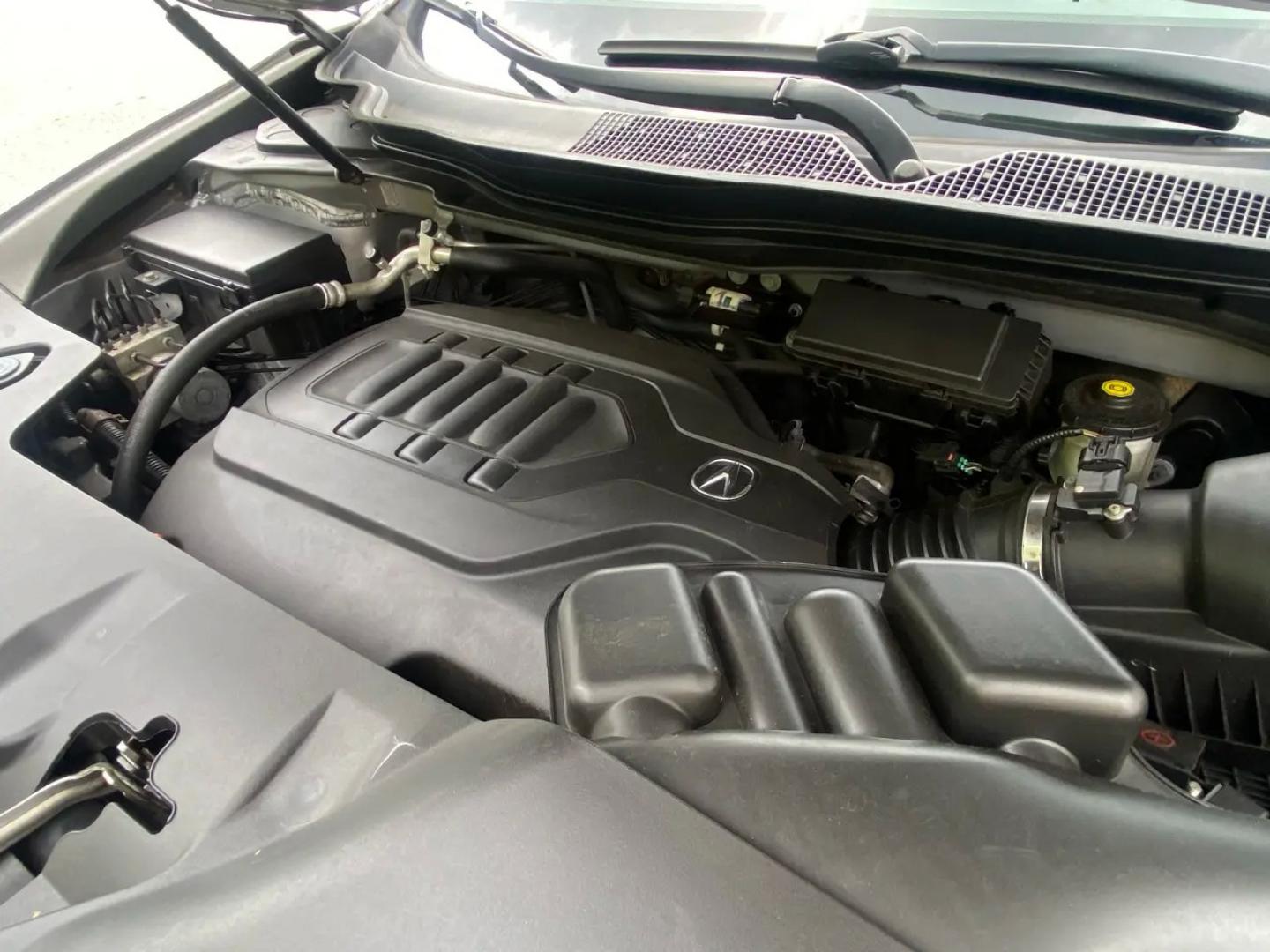 2016 Gray /Black Acura MDX SH-AWD 9-Spd AT (5FRYD4H22GB) with an 3.5L V6 SOHC 24V engine, 9A transmission, located at 215 Milton St, Dedham, MA, 02026, (781) 329-5144, 42.241905, -71.157295 - Get ready to hit the road in style with this sleek and sophisticated Gray 2016 Acura MDX! This luxurious SUV offers everything you need for a smooth and safe ride, from its advanced traction control and vehicle stability control system to its array of airbags for added peace of mind. With keyless en- Photo#23