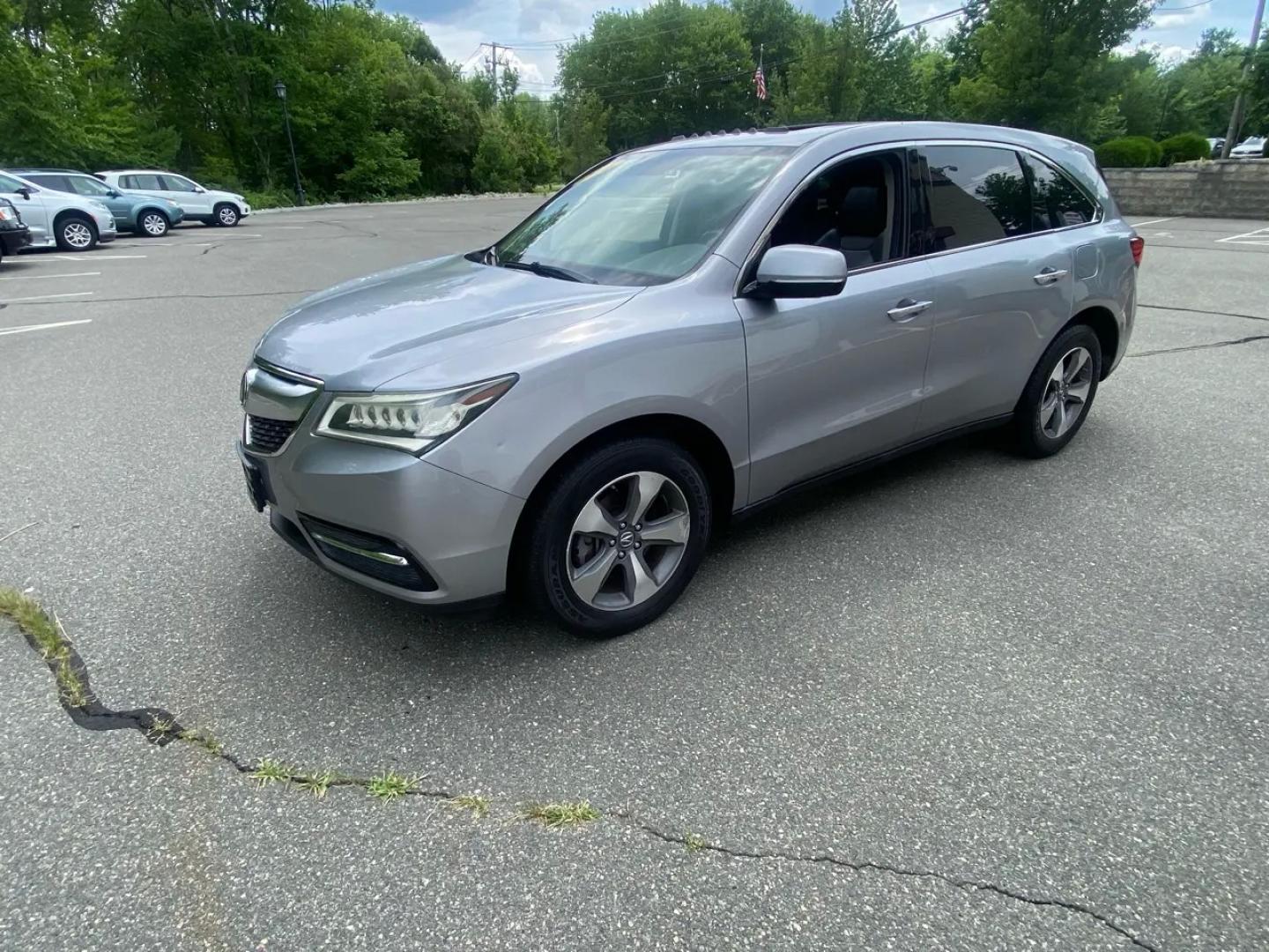 2016 Gray /Black Acura MDX SH-AWD 9-Spd AT (5FRYD4H22GB) with an 3.5L V6 SOHC 24V engine, 9A transmission, located at 215 Milton St, Dedham, MA, 02026, (781) 329-5144, 42.241905, -71.157295 - Get ready to hit the road in style with this sleek and sophisticated Gray 2016 Acura MDX! This luxurious SUV offers everything you need for a smooth and safe ride, from its advanced traction control and vehicle stability control system to its array of airbags for added peace of mind. With keyless en- Photo#3