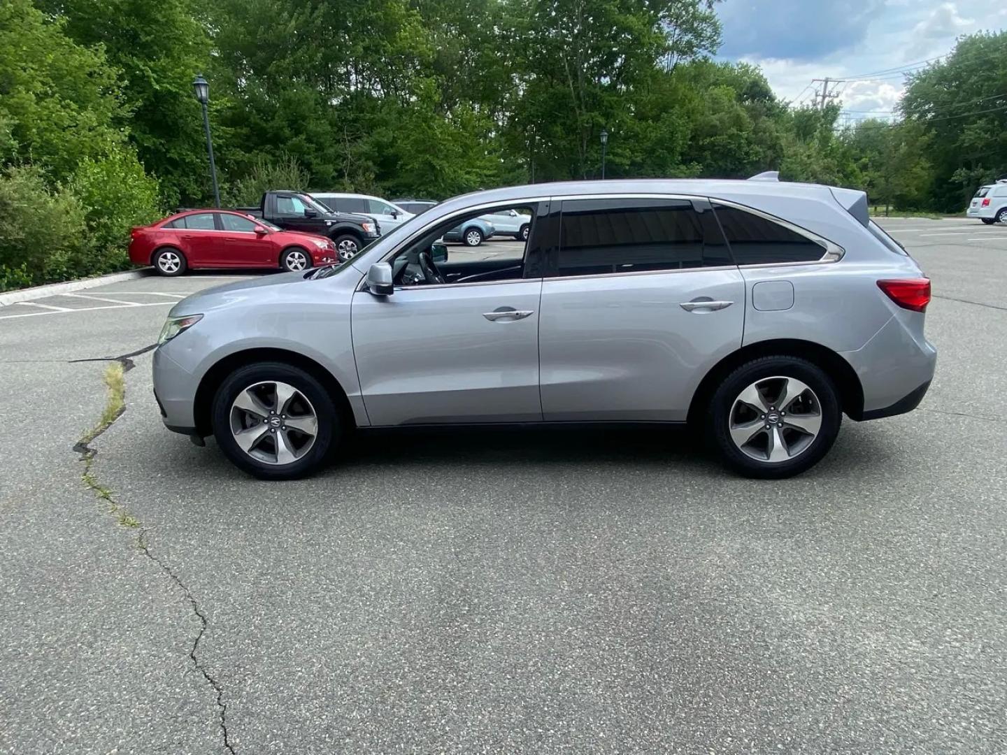 2016 Gray /Black Acura MDX SH-AWD 9-Spd AT (5FRYD4H22GB) with an 3.5L V6 SOHC 24V engine, 9A transmission, located at 215 Milton St, Dedham, MA, 02026, (781) 329-5144, 42.241905, -71.157295 - Get ready to hit the road in style with this sleek and sophisticated Gray 2016 Acura MDX! This luxurious SUV offers everything you need for a smooth and safe ride, from its advanced traction control and vehicle stability control system to its array of airbags for added peace of mind. With keyless en- Photo#4