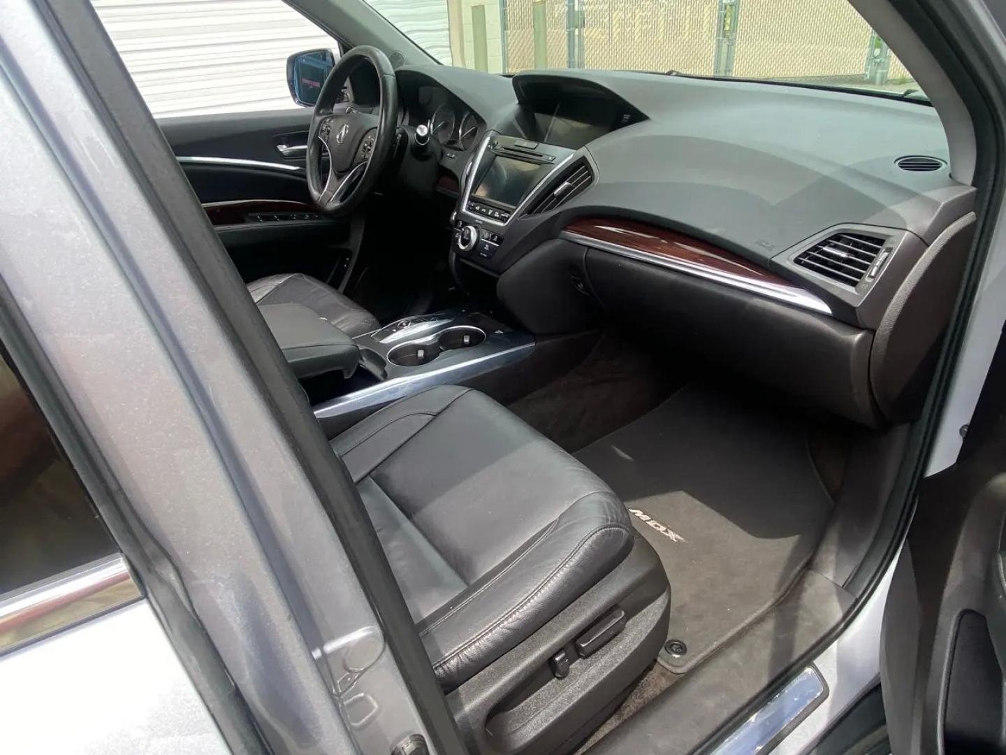 2016 Gray /Black Acura MDX SH-AWD 9-Spd AT (5FRYD4H22GB) with an 3.5L V6 SOHC 24V engine, 9A transmission, located at 215 Milton St, Dedham, MA, 02026, (781) 329-5144, 42.241905, -71.157295 - Get ready to hit the road in style with this sleek and sophisticated Gray 2016 Acura MDX! This luxurious SUV offers everything you need for a smooth and safe ride, from its advanced traction control and vehicle stability control system to its array of airbags for added peace of mind. With keyless en- Photo#12
