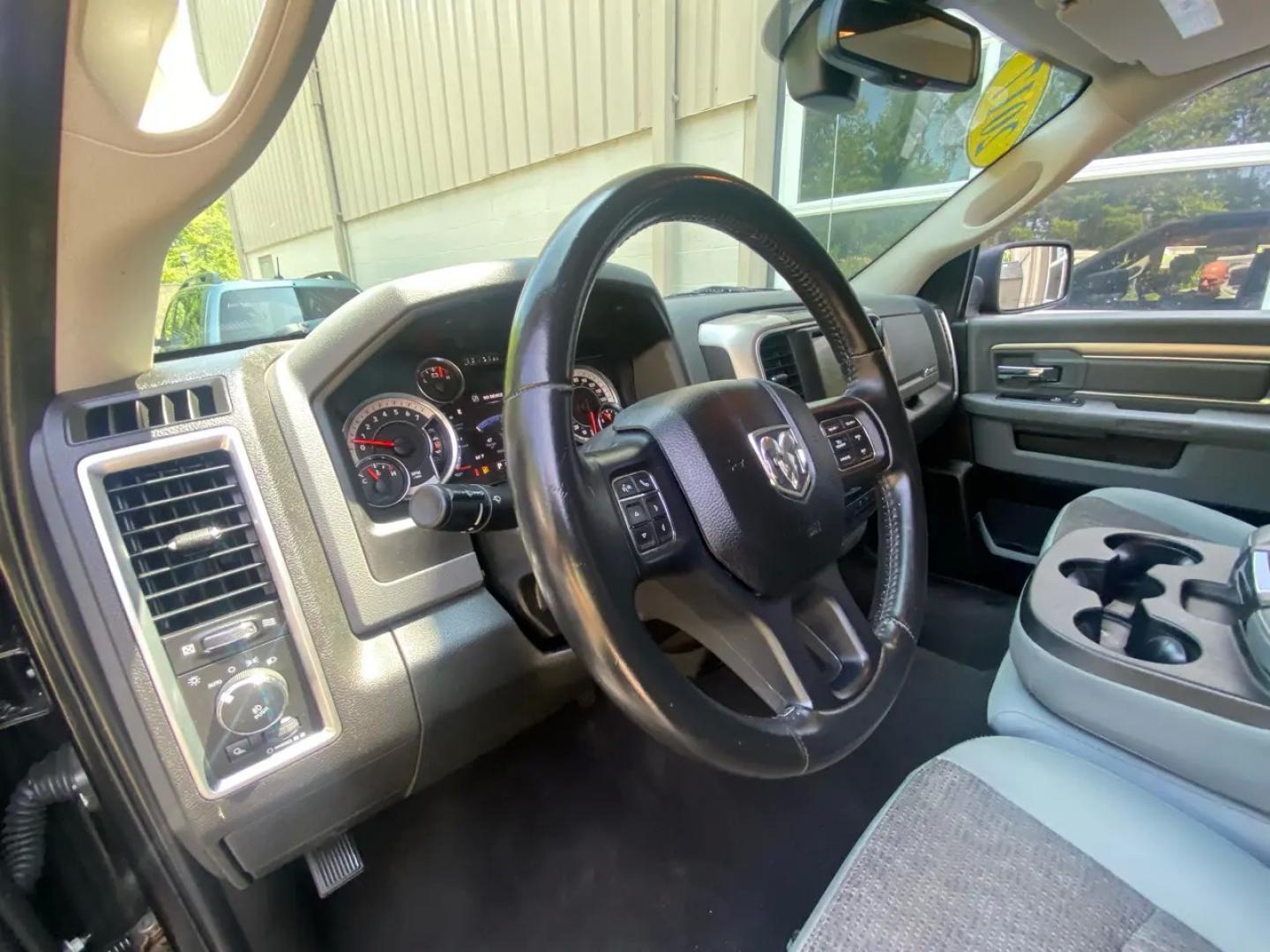 2017 Gray /Grey RAM 1500 SLT Quad Cab 4WD (1C6RR7GTXHS) with an 5.7L V8 OHV 16V engine, 8A transmission, located at 215 Milton St, Dedham, MA, 02026, (781) 329-5144, 42.241905, -71.157295 - This sleek Gray 2017 RAM 1500 is not just a truck - it's a powerhouse of fun waiting to hit the road with you! Equipped with everything you need for a smooth drive, from the ABS Brakes to the Vehicle Stability Control System, this truck ensures safety is always a top priority. Its stylish Alloy Whee- Photo#12