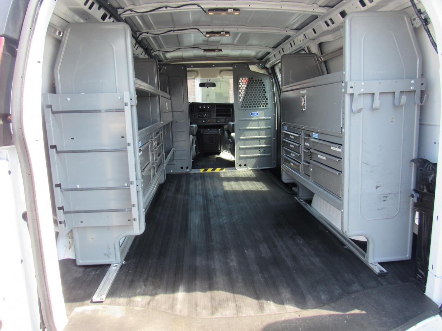 2016 White /Gray Chevrolet Express 2500 Cargo (1GCWGAFF5G1) with an 4.8L V8 FFV engine, 6A transmission, located at 215 Milton St, Dedham, MA, 02026, (781) 329-5144, 42.241905, -71.157295 - Wow, where are you going to find low mileage like this. 27 K miles on the nice work van. Racks and bins already installed. Don't miss this one. All ASPI Motor Cars vehicles are fully service before they are delivered to assure the highest quality used vehicles. Call for details- Photo#10
