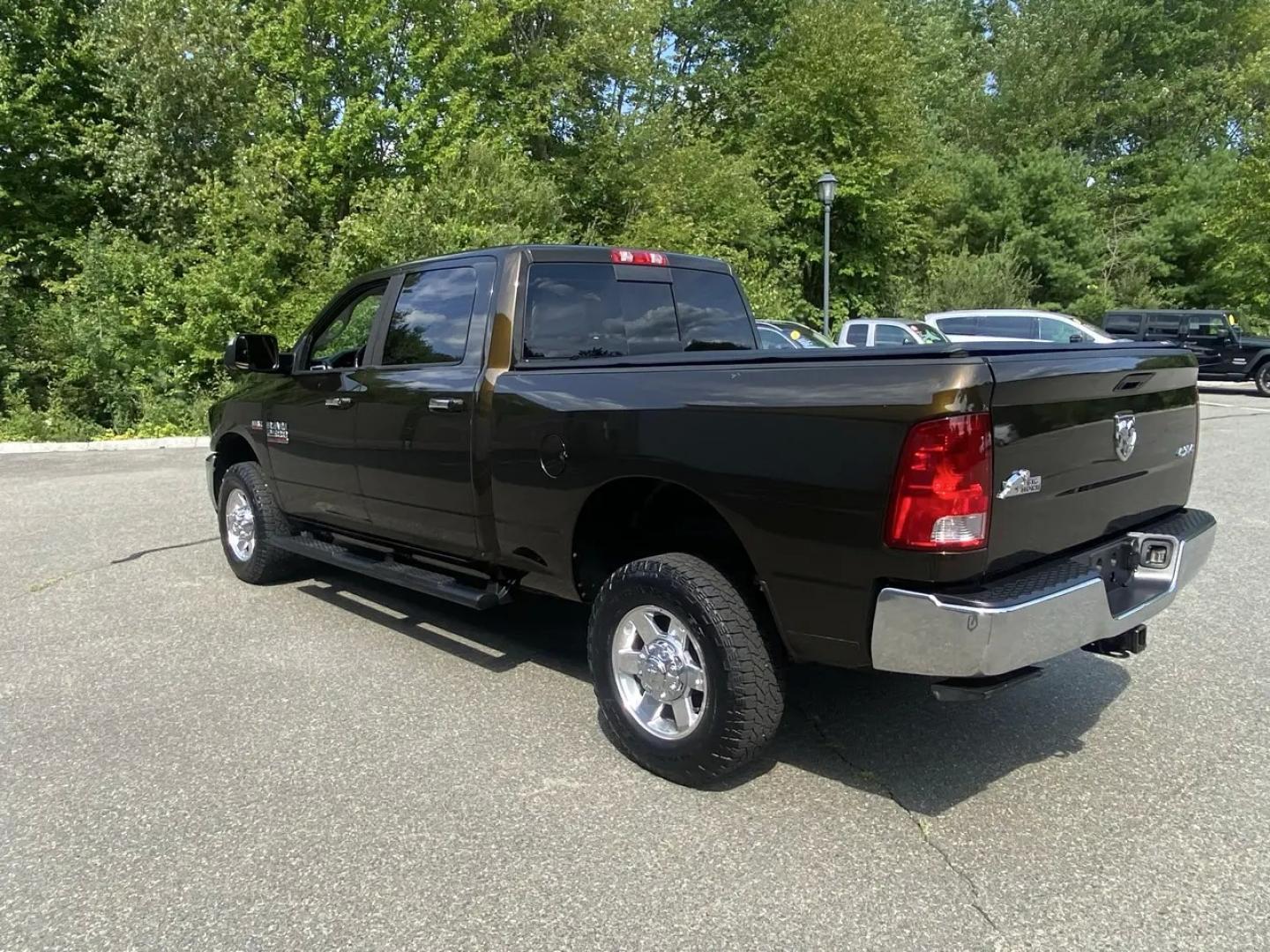 2013 Bronz /Grey RAM 2500 SLT Crew Cab SWB 4WD (3C6TR5DT8DG) with an 5.7L V8 OHV 16V engine, 6A transmission, located at 215 Milton St, Dedham, MA, 02026, (781) 329-5144, 42.241905, -71.157295 - This Bronze 2013 RAM 2500 is the kind of truck that looks ready for work even when it’s headed out for the weekend. Under the hood, the 5.7L gasoline V8 brings the muscle, while 4WD and a confident mix of traction control, ABS, and stability control help keep things planted when the road (or jobsi- Photo#6