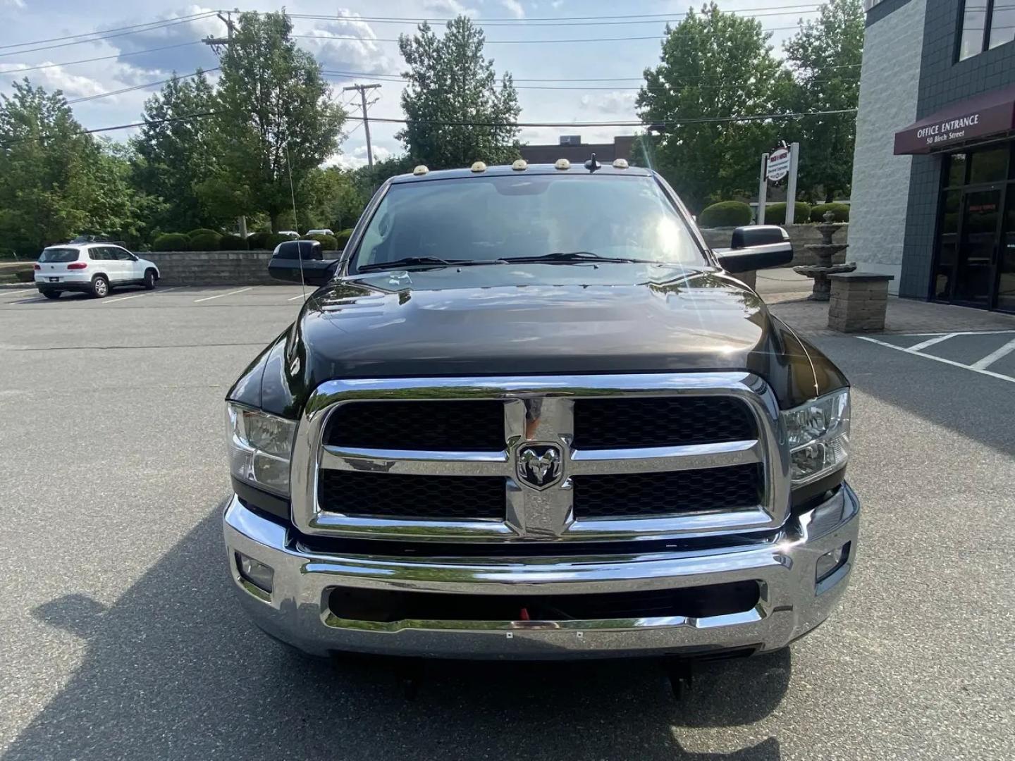 2013 Bronz /Grey RAM 2500 SLT Crew Cab SWB 4WD (3C6TR5DT8DG) with an 5.7L V8 OHV 16V engine, 6A transmission, located at 215 Milton St, Dedham, MA, 02026, (781) 329-5144, 42.241905, -71.157295 - This Bronze 2013 RAM 2500 is the kind of truck that looks ready for work even when it’s headed out for the weekend. Under the hood, the 5.7L gasoline V8 brings the muscle, while 4WD and a confident mix of traction control, ABS, and stability control help keep things planted when the road (or jobsi- Photo#7