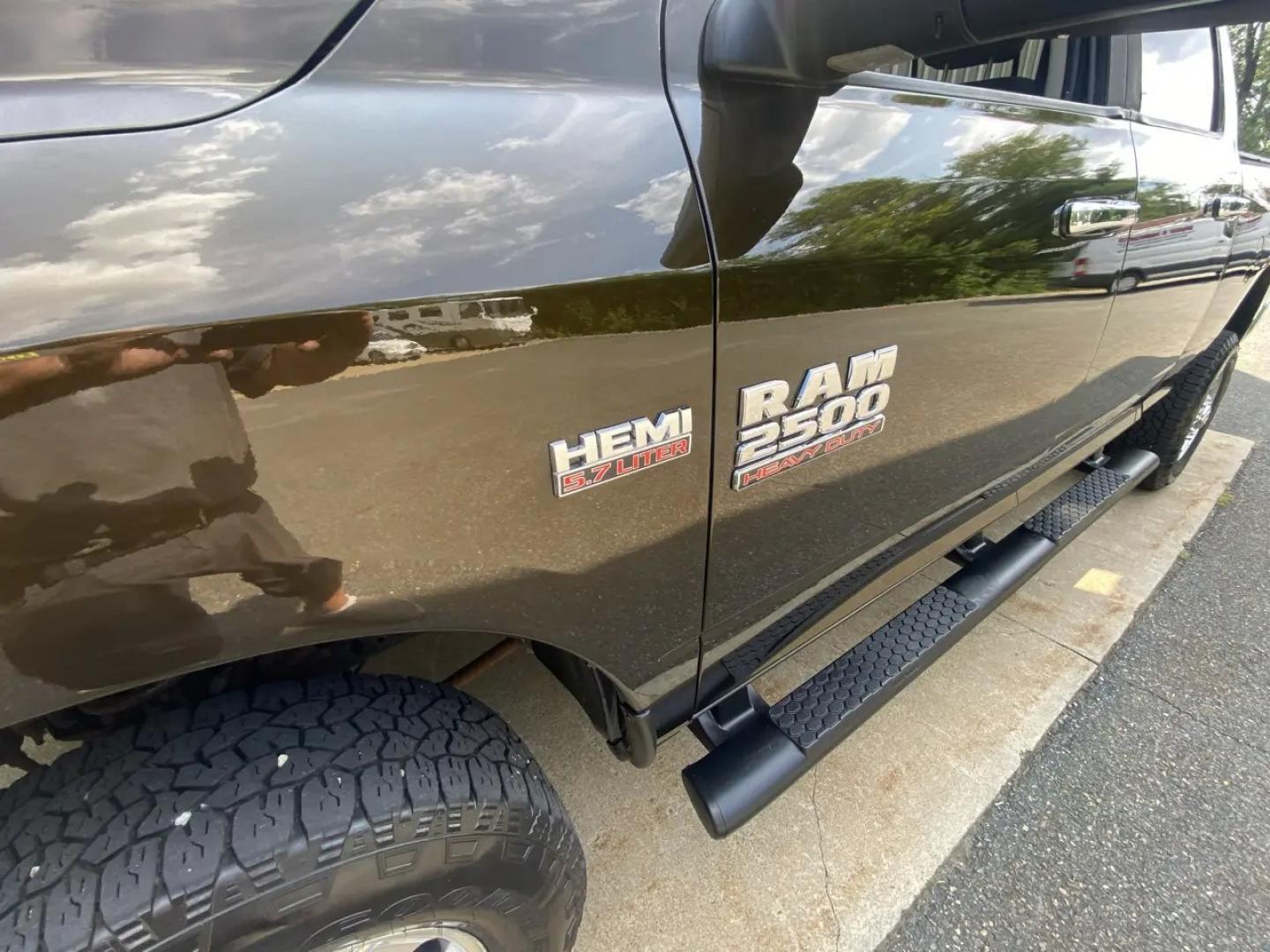 2013 Bronz /Grey RAM 2500 SLT Crew Cab SWB 4WD (3C6TR5DT8DG) with an 5.7L V8 OHV 16V engine, 6A transmission, located at 215 Milton St, Dedham, MA, 02026, (781) 329-5144, 42.241905, -71.157295 - This Bronze 2013 RAM 2500 is the kind of truck that looks ready for work even when it’s headed out for the weekend. Under the hood, the 5.7L gasoline V8 brings the muscle, while 4WD and a confident mix of traction control, ABS, and stability control help keep things planted when the road (or jobsi- Photo#23