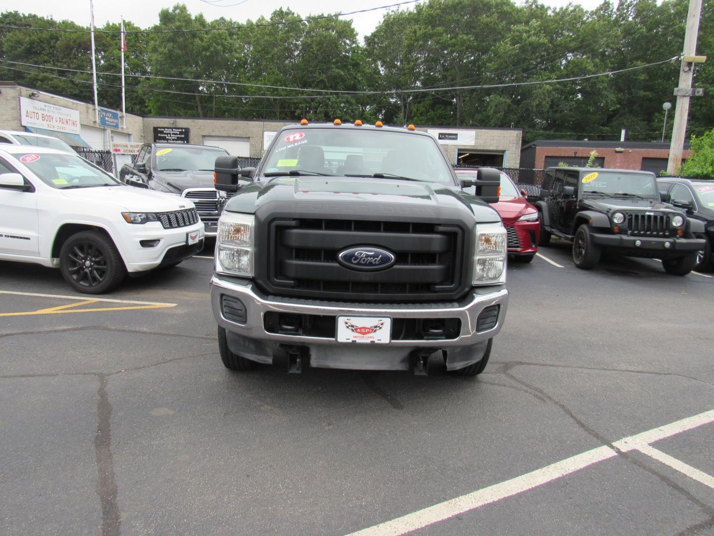 2012 Green /Gray Ford F-250 SD King Ranch Crew Cab 4WD (1FT7W2B63CE) with an 6.2L V8 OHV 16V engine, 6-Speed Automatic transmission, located at 215 Milton St, Dedham, MA, 02026, (781) 329-5144, 42.241905, -71.157295 - This nice plow truck has a brand-new Aluminum bed. Frame is in excellent condition and has been coated. Comes with an 8' Fisher Minute Ma plow and Fish Stick controller. All ASPI Motor Cras vehicles are fully serviced before they are delivered. All Commercial vehicles are sold as-is. We encourage al- Photo#1