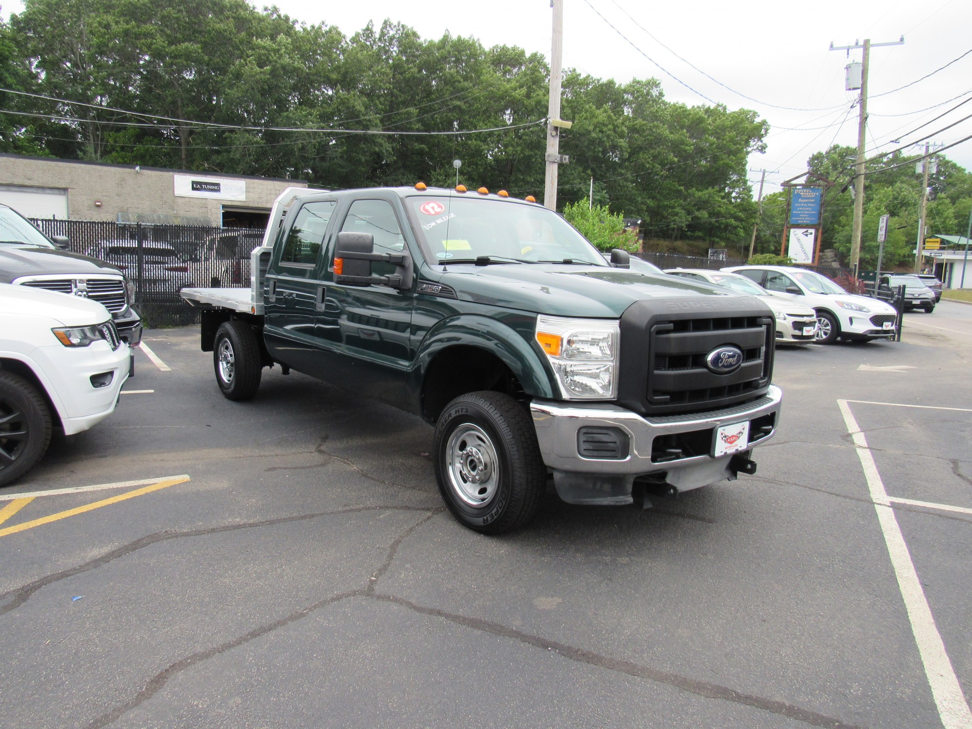 photo of 2012 Ford F-250 SD Crew Cab 4WD w/Fisher Plow