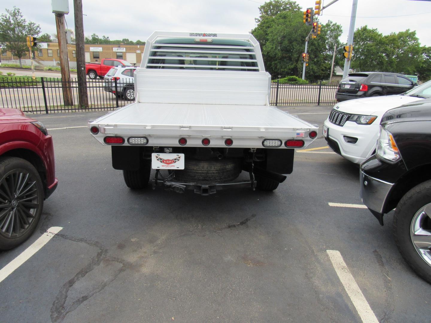 2012 Green /Gray Ford F-250 SD King Ranch Crew Cab 4WD (1FT7W2B63CE) with an 6.2L V8 OHV 16V engine, 6-Speed Automatic transmission, located at 215 Milton St, Dedham, MA, 02026, (781) 329-5144, 42.241905, -71.157295 - This nice plow truck has a brand-new Aluminum bed. Frame is in excellent condition and has been coated. Comes with an 8' Fisher Minute Ma plow and Fish Stick controller. All ASPI Motor Cras vehicles are fully serviced before they are delivered. All Commercial vehicles are sold as-is. We encourage al- Photo#5
