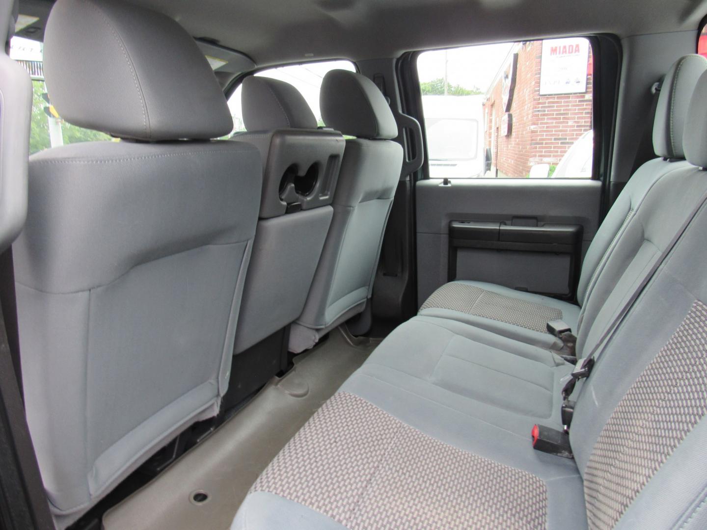 2012 Green /Gray Ford F-250 SD King Ranch Crew Cab 4WD (1FT7W2B63CE) with an 6.2L V8 OHV 16V engine, 6-Speed Automatic transmission, located at 215 Milton St, Dedham, MA, 02026, (781) 329-5144, 42.241905, -71.157295 - This nice plow truck has a brand-new Aluminum bed. Frame is in excellent condition and has been coated. Comes with an 8' Fisher Minute Ma plow and Fish Stick controller. All ASPI Motor Cras vehicles are fully serviced before they are delivered. All Commercial vehicles are sold as-is. We encourage al- Photo#16