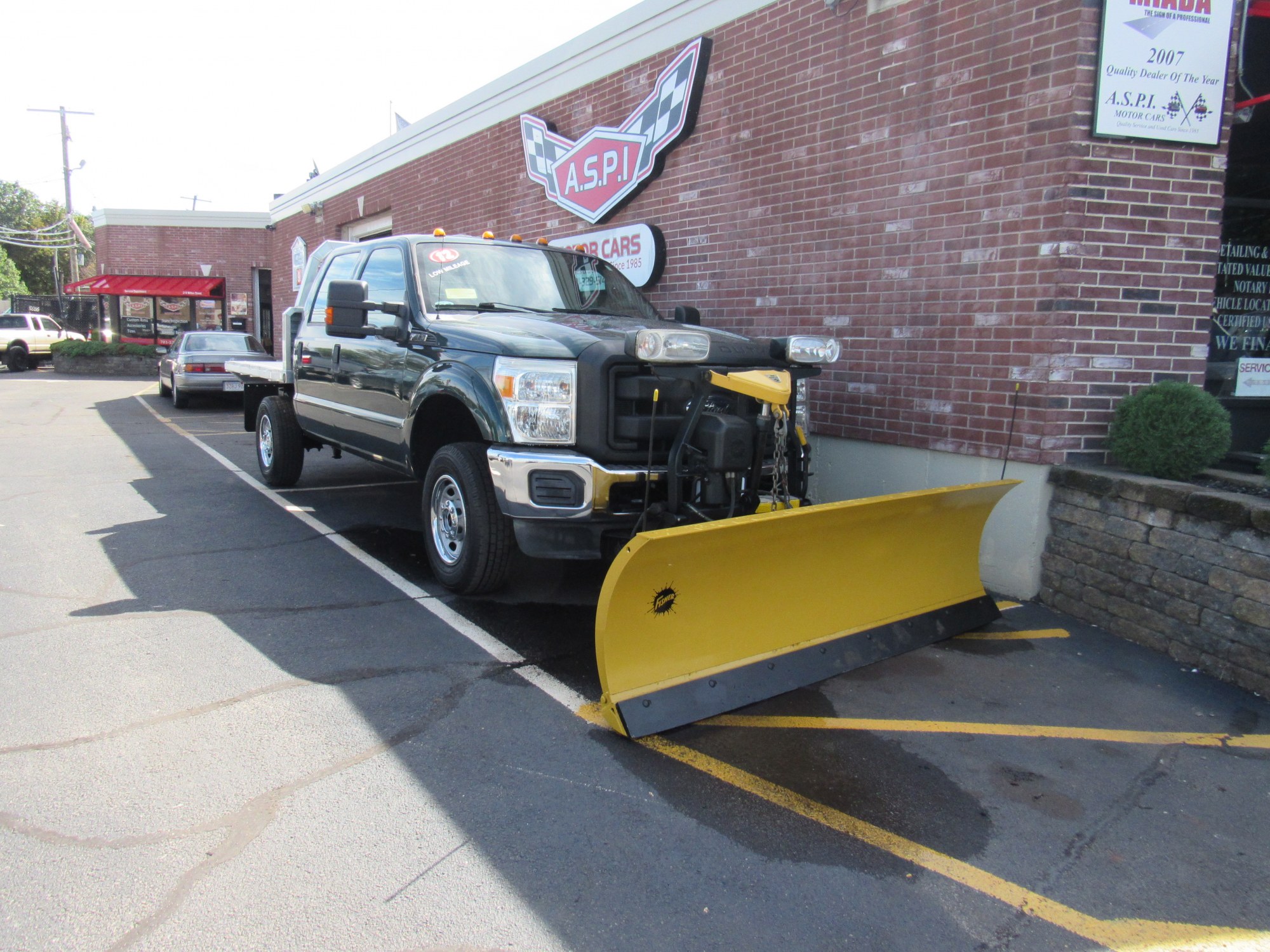photo of 2012 Ford F-250 SD Crew Cab 4WD w/Fisher Plow