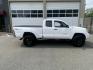 2011 White /Tan Toyota Tacoma Access Cab V6 4WD (5TFUU4EN8BX) with an 4.0L V6 DOHC 24V engine, 5M transmission, located at 215 Milton St, Dedham, MA, 02026, (781) 329-5144, 42.241905, -71.157295 - Get ready to hit the road in this rugged and reliable 2011 Toyota Tacoma! This white beauty is equipped with all the essentials to make your driving experience smooth and secure. From the powerful anti-lock braking system to the stability control system, you can drive with confidence knowing that yo- Photo#2