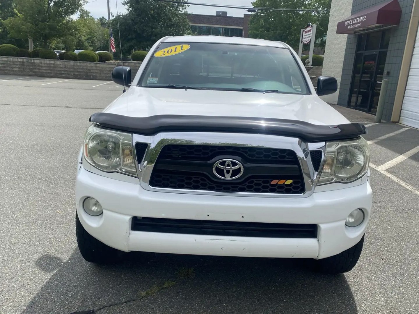 2011 White /Tan Toyota Tacoma Access Cab V6 4WD (5TFUU4EN8BX) with an 4.0L V6 DOHC 24V engine, 5M transmission, located at 215 Milton St, Dedham, MA, 02026, (781) 329-5144, 42.241905, -71.157295 - Get ready to hit the road in this rugged and reliable 2011 Toyota Tacoma! This white beauty is equipped with all the essentials to make your driving experience smooth and secure. From the powerful anti-lock braking system to the stability control system, you can drive with confidence knowing that yo- Photo#7