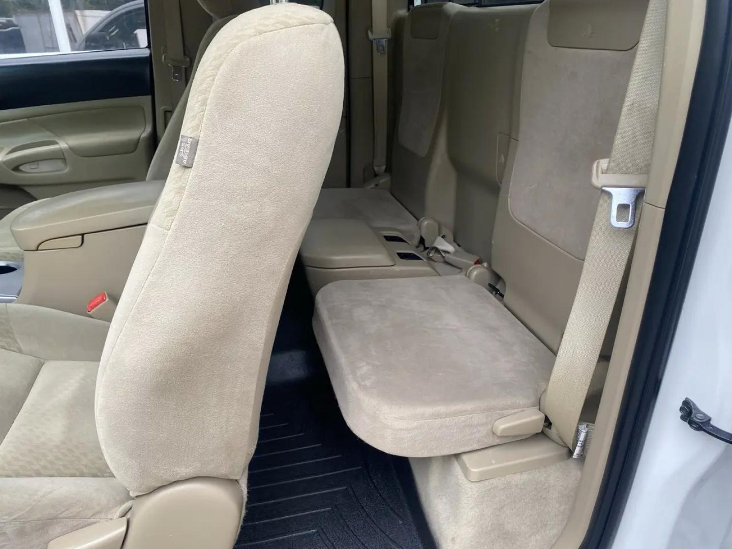 2011 White /Tan Toyota Tacoma Access Cab V6 4WD (5TFUU4EN8BX) with an 4.0L V6 DOHC 24V engine, 5M transmission, located at 215 Milton St, Dedham, MA, 02026, (781) 329-5144, 42.241905, -71.157295 - Get ready to hit the road in this rugged and reliable 2011 Toyota Tacoma! This white beauty is equipped with all the essentials to make your driving experience smooth and secure. From the powerful anti-lock braking system to the stability control system, you can drive with confidence knowing that yo- Photo#16