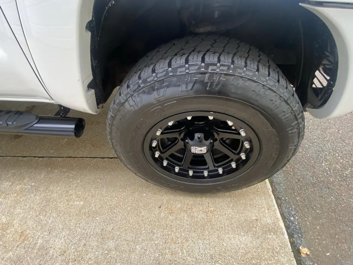 2011 White /Tan Toyota Tacoma Access Cab V6 4WD (5TFUU4EN8BX) with an 4.0L V6 DOHC 24V engine, 5M transmission, located at 215 Milton St, Dedham, MA, 02026, (781) 329-5144, 42.241905, -71.157295 - Get ready to hit the road in this rugged and reliable 2011 Toyota Tacoma! This white beauty is equipped with all the essentials to make your driving experience smooth and secure. From the powerful anti-lock braking system to the stability control system, you can drive with confidence knowing that yo- Photo#20