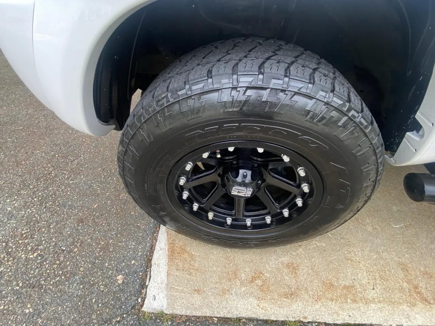 2011 White /Tan Toyota Tacoma Access Cab V6 4WD (5TFUU4EN8BX) with an 4.0L V6 DOHC 24V engine, 5M transmission, located at 215 Milton St, Dedham, MA, 02026, (781) 329-5144, 42.241905, -71.157295 - Get ready to hit the road in this rugged and reliable 2011 Toyota Tacoma! This white beauty is equipped with all the essentials to make your driving experience smooth and secure. From the powerful anti-lock braking system to the stability control system, you can drive with confidence knowing that yo- Photo#19