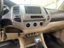 2011 White /Tan Toyota Tacoma Access Cab V6 4WD (5TFUU4EN8BX) with an 4.0L V6 DOHC 24V engine, 5M transmission, located at 215 Milton St, Dedham, MA, 02026, (781) 329-5144, 42.241905, -71.157295 - Get ready to hit the road in this rugged and reliable 2011 Toyota Tacoma! This white beauty is equipped with all the essentials to make your driving experience smooth and secure. From the powerful anti-lock braking system to the stability control system, you can drive with confidence knowing that yo- Photo#11