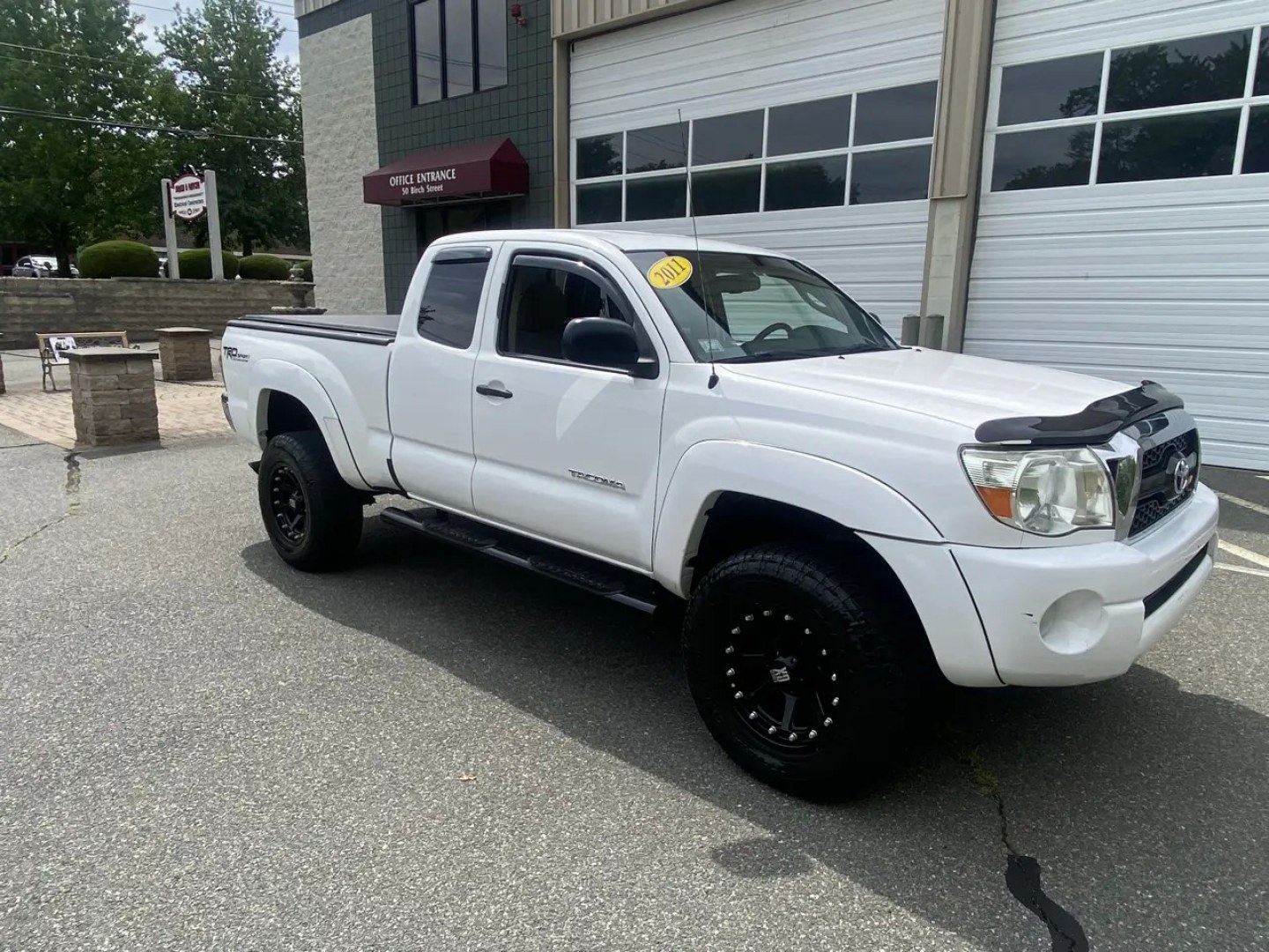 2011 White /Tan Toyota Tacoma Access Cab V6 4WD (5TFUU4EN8BX) with an 4.0L V6 DOHC 24V engine, 5M transmission, located at 215 Milton St, Dedham, MA, 02026, (781) 329-5144, 42.241905, -71.157295 - Get ready to hit the road in this rugged and reliable 2011 Toyota Tacoma! This white beauty is equipped with all the essentials to make your driving experience smooth and secure. From the powerful anti-lock braking system to the stability control system, you can drive with confidence knowing that yo- Photo#1