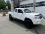 2011 White /Tan Toyota Tacoma Access Cab V6 4WD (5TFUU4EN8BX) with an 4.0L V6 DOHC 24V engine, 5M transmission, located at 215 Milton St, Dedham, MA, 02026, (781) 329-5144, 42.241905, -71.157295 - Get ready to hit the road in this rugged and reliable 2011 Toyota Tacoma! This white beauty is equipped with all the essentials to make your driving experience smooth and secure. From the powerful anti-lock braking system to the stability control system, you can drive with confidence knowing that yo- Photo#1
