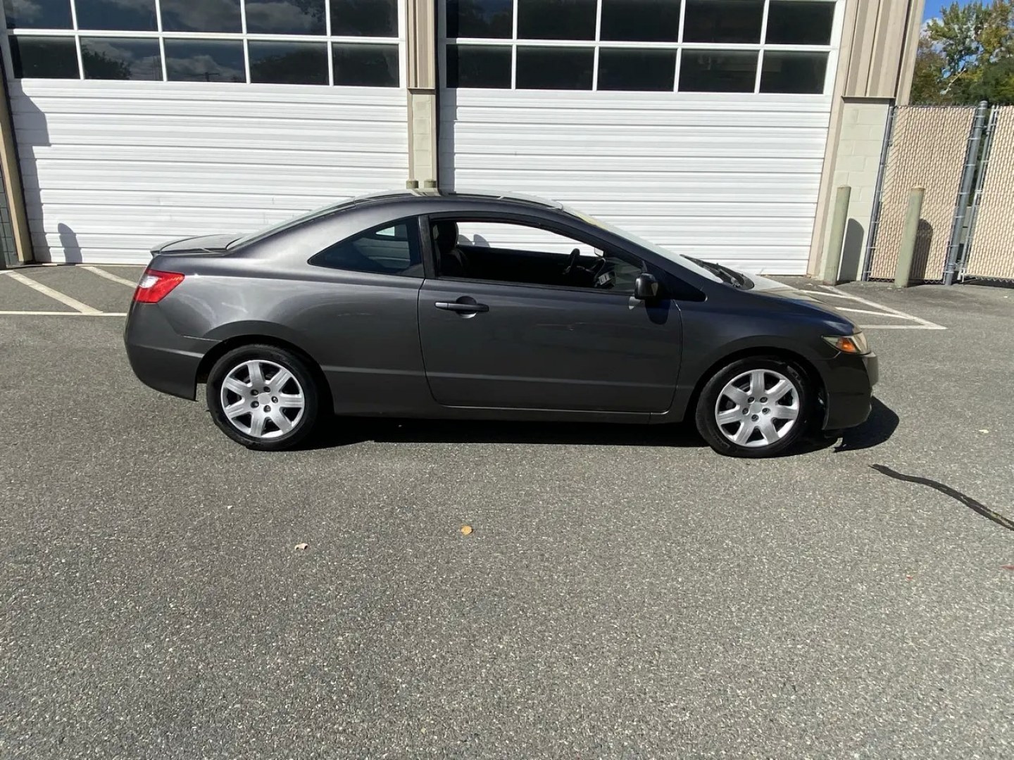 2010 Gray /Grey Honda Civic LX Coupe 5-Speed AT (2HGFG1B64AH) with an 1.8L L4 SOHC 16V engine, 5A transmission, located at 215 Milton St, Dedham, MA, 02026, (781) 329-5144, 42.241905, -71.157295 - Turn heads and hit the road in this sleek Gray 2010 Honda Civic. This reliable ride offers peace of mind with its safety features such as multiple airbags, ABS brakes, and a trunk anti-trap device. With power windows, keyless entry, and cruise control, this Civic makes every drive a breeze. Let the- Photo#2
