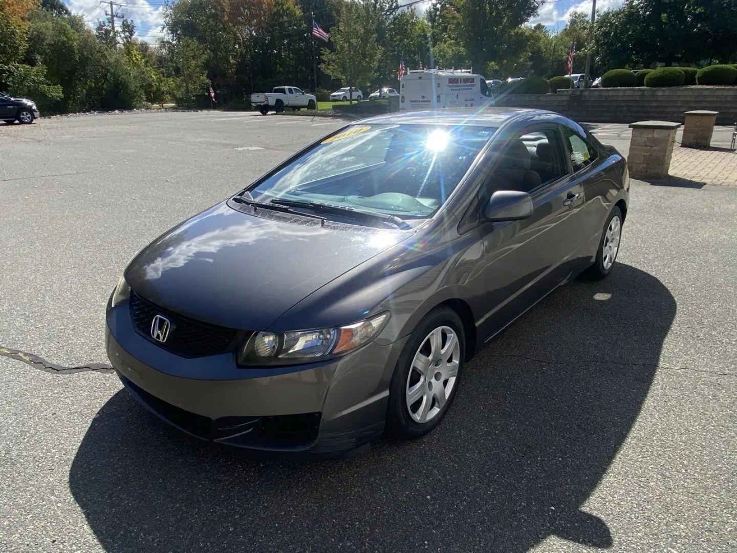 2010 Gray /Grey Honda Civic LX Coupe 5-Speed AT (2HGFG1B64AH) with an 1.8L L4 SOHC 16V engine, 5A transmission, located at 215 Milton St, Dedham, MA, 02026, (781) 329-5144, 42.241905, -71.157295 - Turn heads and hit the road in this sleek Gray 2010 Honda Civic. This reliable ride offers peace of mind with its safety features such as multiple airbags, ABS brakes, and a trunk anti-trap device. With power windows, keyless entry, and cruise control, this Civic makes every drive a breeze. Let the- Photo#4
