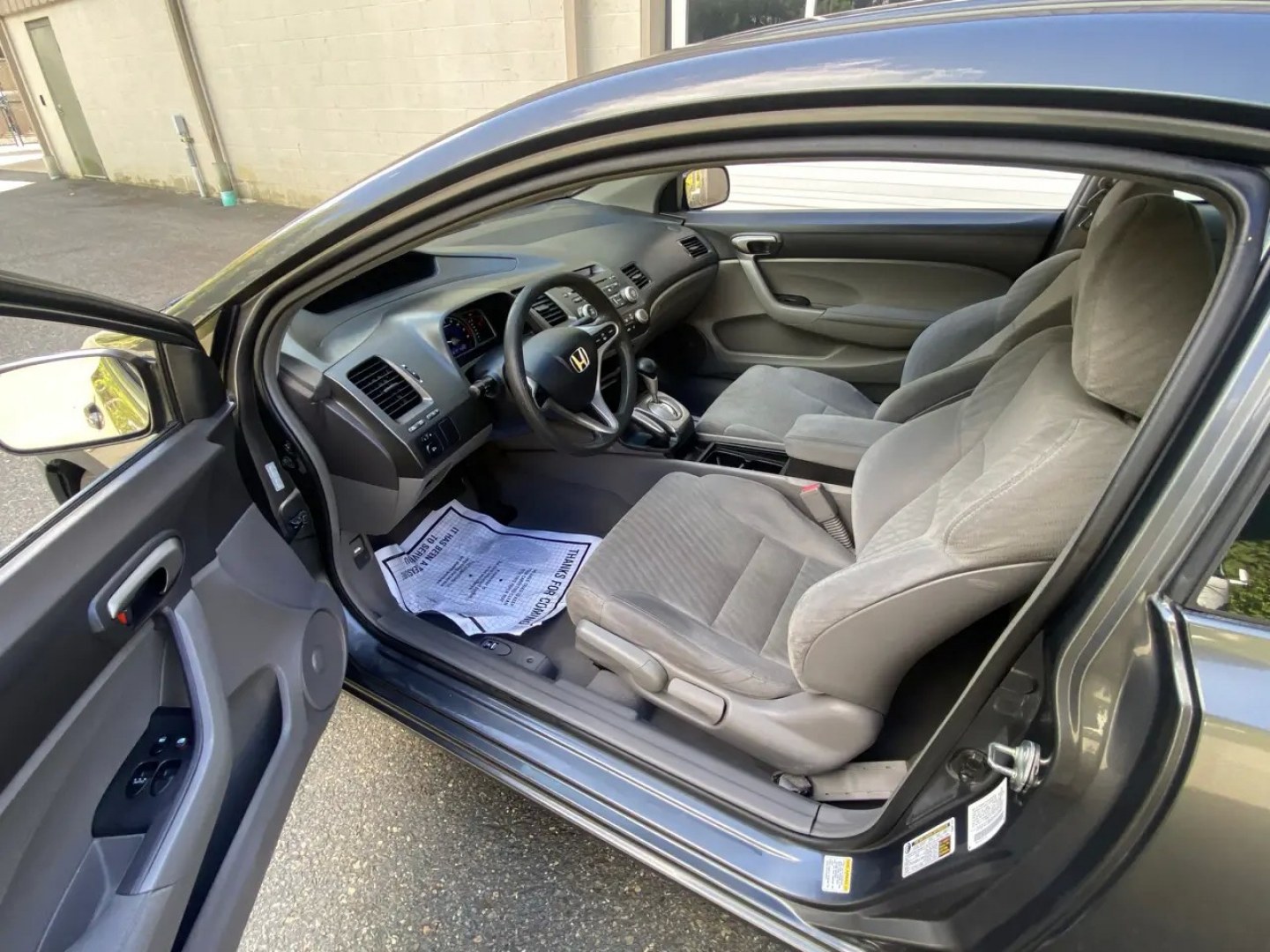 2010 Gray /Grey Honda Civic LX Coupe 5-Speed AT (2HGFG1B64AH) with an 1.8L L4 SOHC 16V engine, 5A transmission, located at 215 Milton St, Dedham, MA, 02026, (781) 329-5144, 42.241905, -71.157295 - Turn heads and hit the road in this sleek Gray 2010 Honda Civic. This reliable ride offers peace of mind with its safety features such as multiple airbags, ABS brakes, and a trunk anti-trap device. With power windows, keyless entry, and cruise control, this Civic makes every drive a breeze. Let the- Photo#10