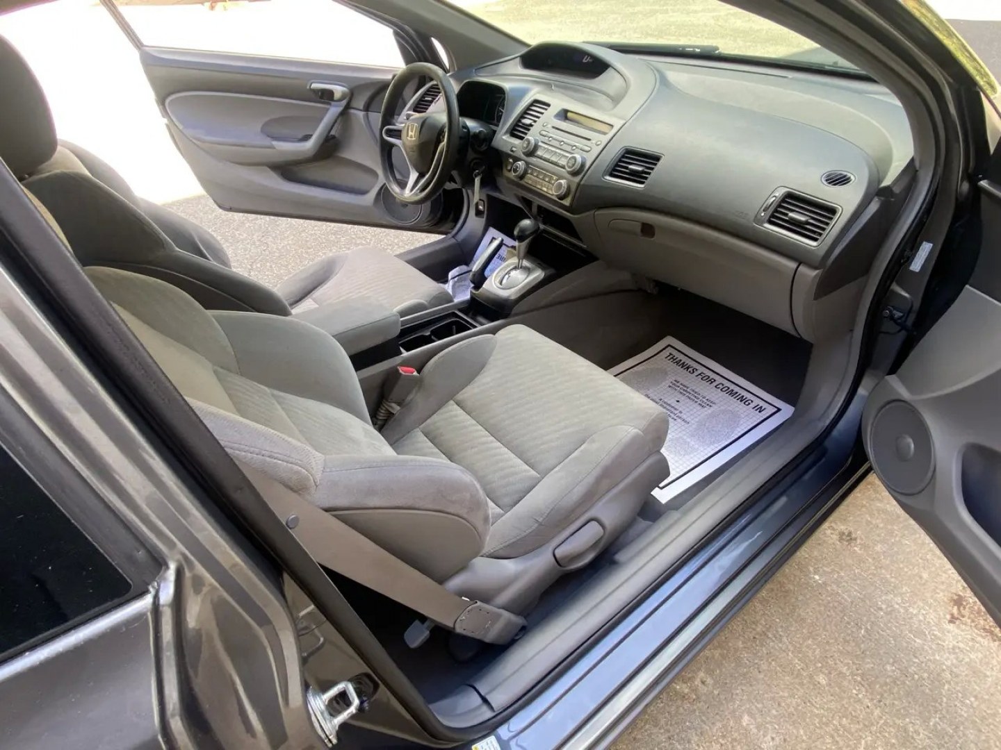 2010 Gray /Grey Honda Civic LX Coupe 5-Speed AT (2HGFG1B64AH) with an 1.8L L4 SOHC 16V engine, 5A transmission, located at 215 Milton St, Dedham, MA, 02026, (781) 329-5144, 42.241905, -71.157295 - Turn heads and hit the road in this sleek Gray 2010 Honda Civic. This reliable ride offers peace of mind with its safety features such as multiple airbags, ABS brakes, and a trunk anti-trap device. With power windows, keyless entry, and cruise control, this Civic makes every drive a breeze. Let the- Photo#11