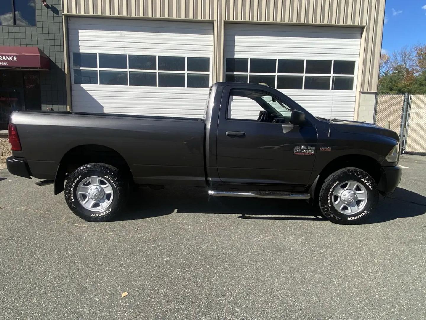 2016 Gray /Grey Ram 2500 Tradesman Regular Cab 4WD (3C6LR5AT2GG) with an 5.7L V8 OHV 16V engine, 6A transmission, located at 215 Milton St, Dedham, MA, 02026, (781) 329-5144, 42.241905, -71.157295 - Meet a gray 2016 RAM 2500 that’s built for real work and still knows how to have a little fun doing it. Under the hood, the 5.7L V8 gasoline engine brings that classic eight-cylinder punch, while the automatic transmission keeps things smooth whether you’re cruising through town or heading out t- Photo#2