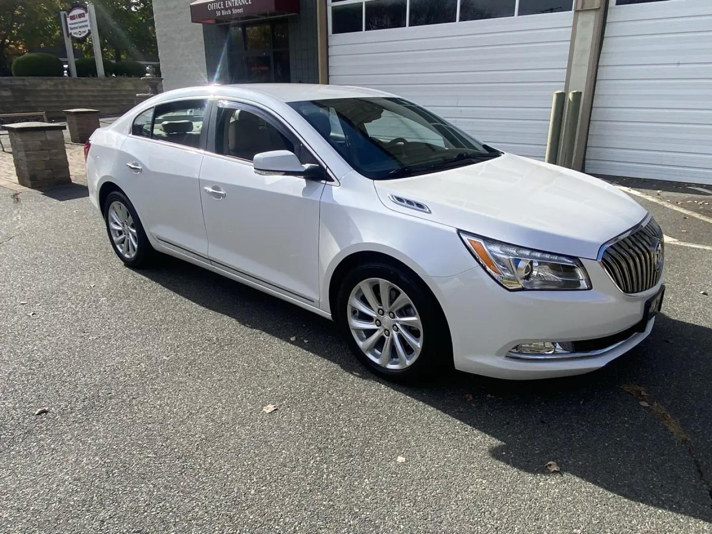 2016 Pearl /Tan Buick LaCrosse Leather Package (1G4GB5G36GF) with an 3.6L V6 DOHC 24V FFV engine, 6A transmission, located at 215 Milton St, Dedham, MA, 02026, (781) 329-5144, 42.241905, -71.157295 - Slide into this Pearl White 2016 Buick LaCrosse and you’ll see why it’s such a great everyday upgrade: a smooth, quiet sedan with a confident FWD stance, an automatic transmission, and a strong 3.6L V6 under the hood. It’s the kind of car that makes commutes feel shorter and road trips feel ea- Photo#1