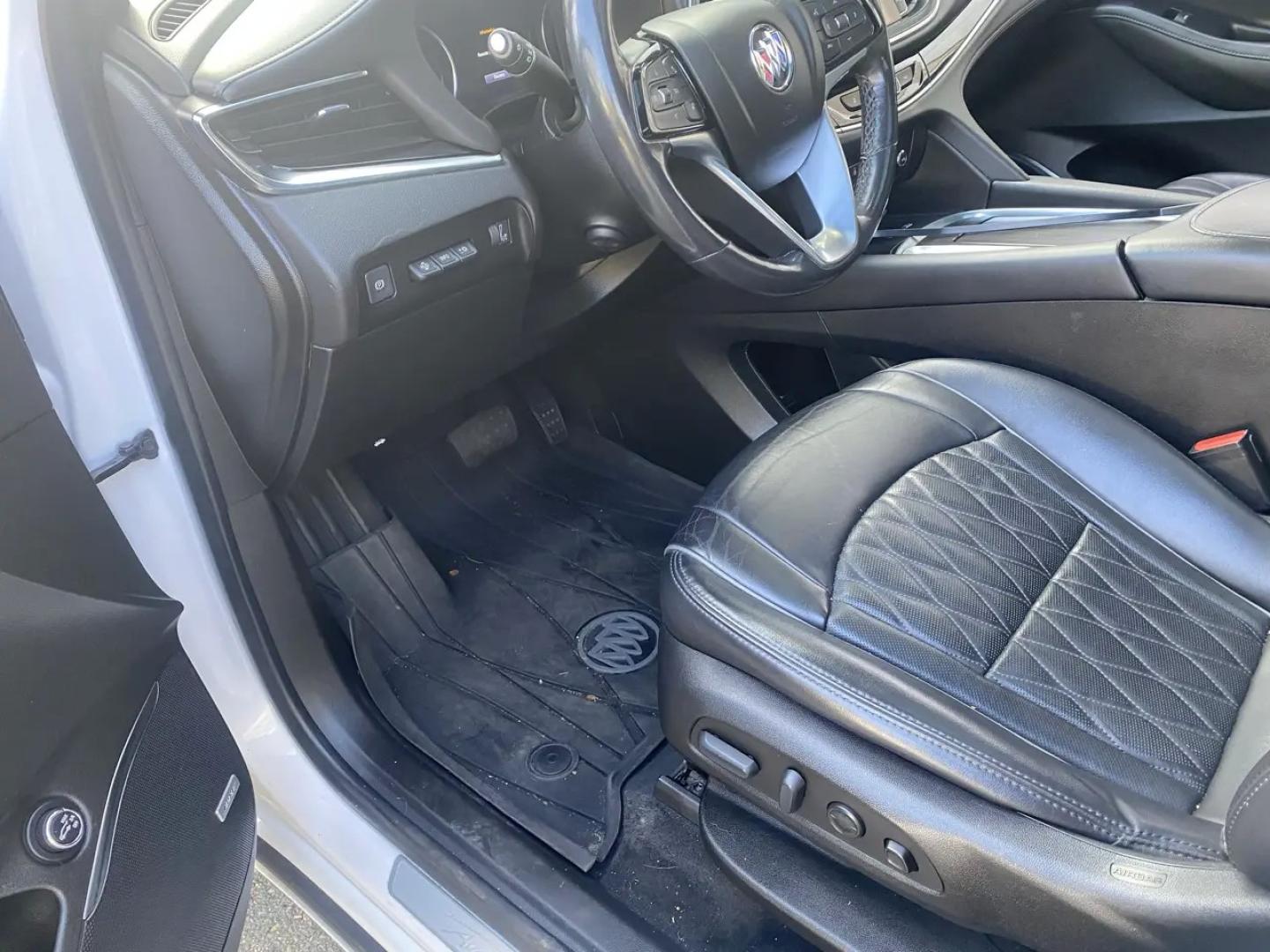2023 White /charcoal Buick Enclave Avenir AWD (5GAEVCKW1PJ) with an 3.6L V6 DOHC 24V engine, 9A transmission, located at 215 Milton St, Dedham, MA, 02026, (781) 329-5144, 42.241905, -71.157295 - Meet the White 2023 Buick Enclave—an SUV that makes everyday driving feel a little more first-class. Under the hood, a 3.6L V6 pairs with a smooth automatic transmission, while confident AWD helps you stay composed when the weather (or the road) gets unpredictable. Stability and traction systems w- Photo#9