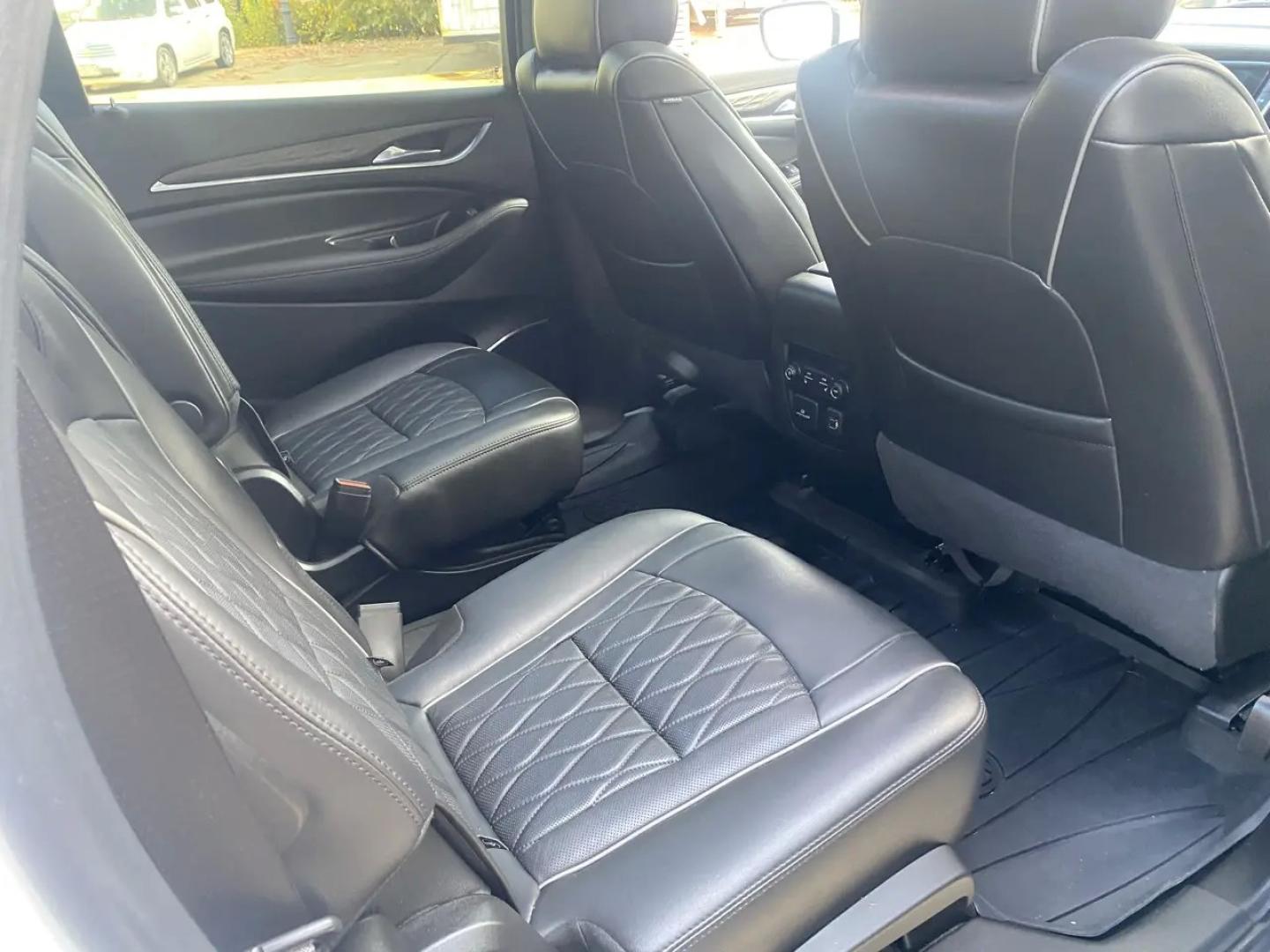 2023 White /charcoal Buick Enclave Avenir AWD (5GAEVCKW1PJ) with an 3.6L V6 DOHC 24V engine, 9A transmission, located at 215 Milton St, Dedham, MA, 02026, (781) 329-5144, 42.241905, -71.157295 - Meet the White 2023 Buick Enclave—an SUV that makes everyday driving feel a little more first-class. Under the hood, a 3.6L V6 pairs with a smooth automatic transmission, while confident AWD helps you stay composed when the weather (or the road) gets unpredictable. Stability and traction systems w- Photo#12