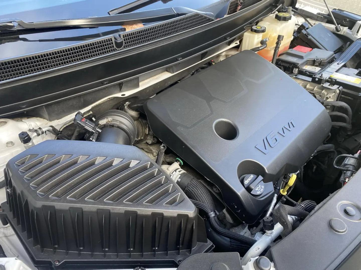 2023 White /charcoal Buick Enclave Avenir AWD (5GAEVCKW1PJ) with an 3.6L V6 DOHC 24V engine, 9A transmission, located at 215 Milton St, Dedham, MA, 02026, (781) 329-5144, 42.241905, -71.157295 - Meet the White 2023 Buick Enclave—an SUV that makes everyday driving feel a little more first-class. Under the hood, a 3.6L V6 pairs with a smooth automatic transmission, while confident AWD helps you stay composed when the weather (or the road) gets unpredictable. Stability and traction systems w- Photo#24