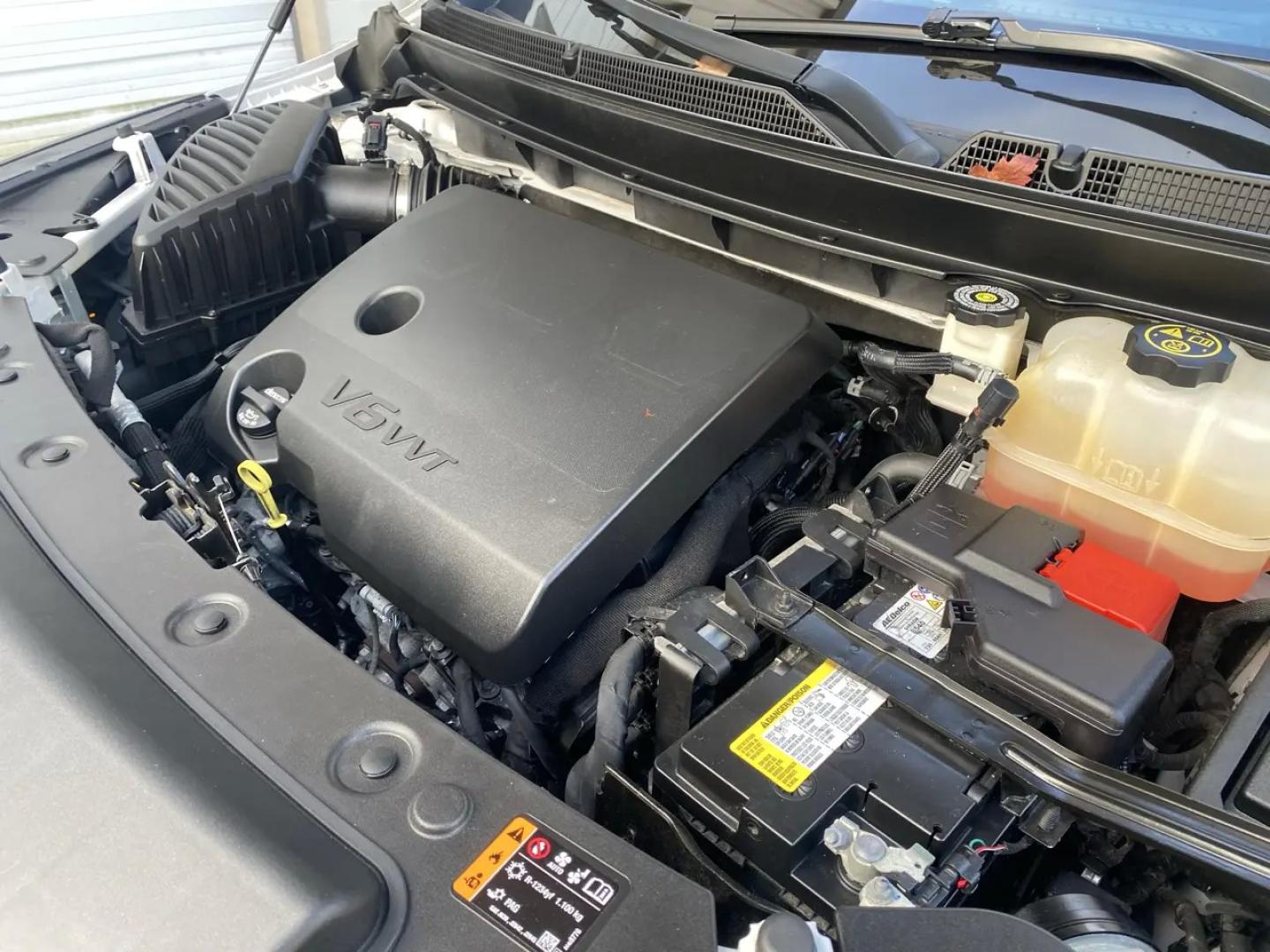 2023 White /charcoal Buick Enclave Avenir AWD (5GAEVCKW1PJ) with an 3.6L V6 DOHC 24V engine, 9A transmission, located at 215 Milton St, Dedham, MA, 02026, (781) 329-5144, 42.241905, -71.157295 - Meet the White 2023 Buick Enclave—an SUV that makes everyday driving feel a little more first-class. Under the hood, a 3.6L V6 pairs with a smooth automatic transmission, while confident AWD helps you stay composed when the weather (or the road) gets unpredictable. Stability and traction systems w- Photo#25